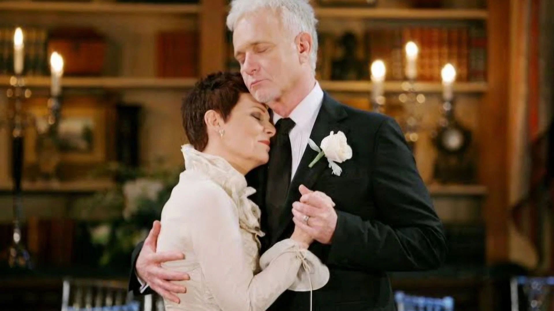 Luke Spencer hugs Tracy Quartermaine (Soap Central via CBS)