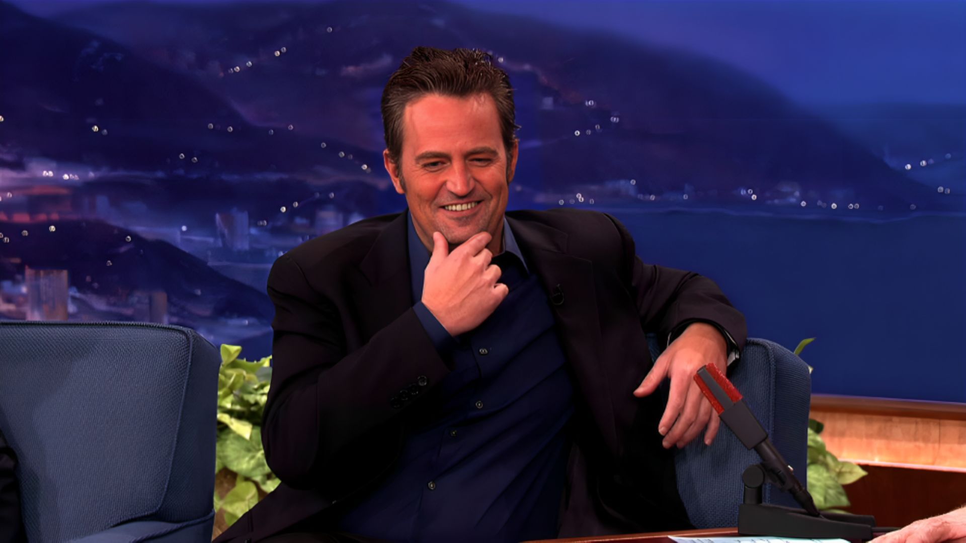 Matthew Perry and his signature humor on Conan (Image via TBS)