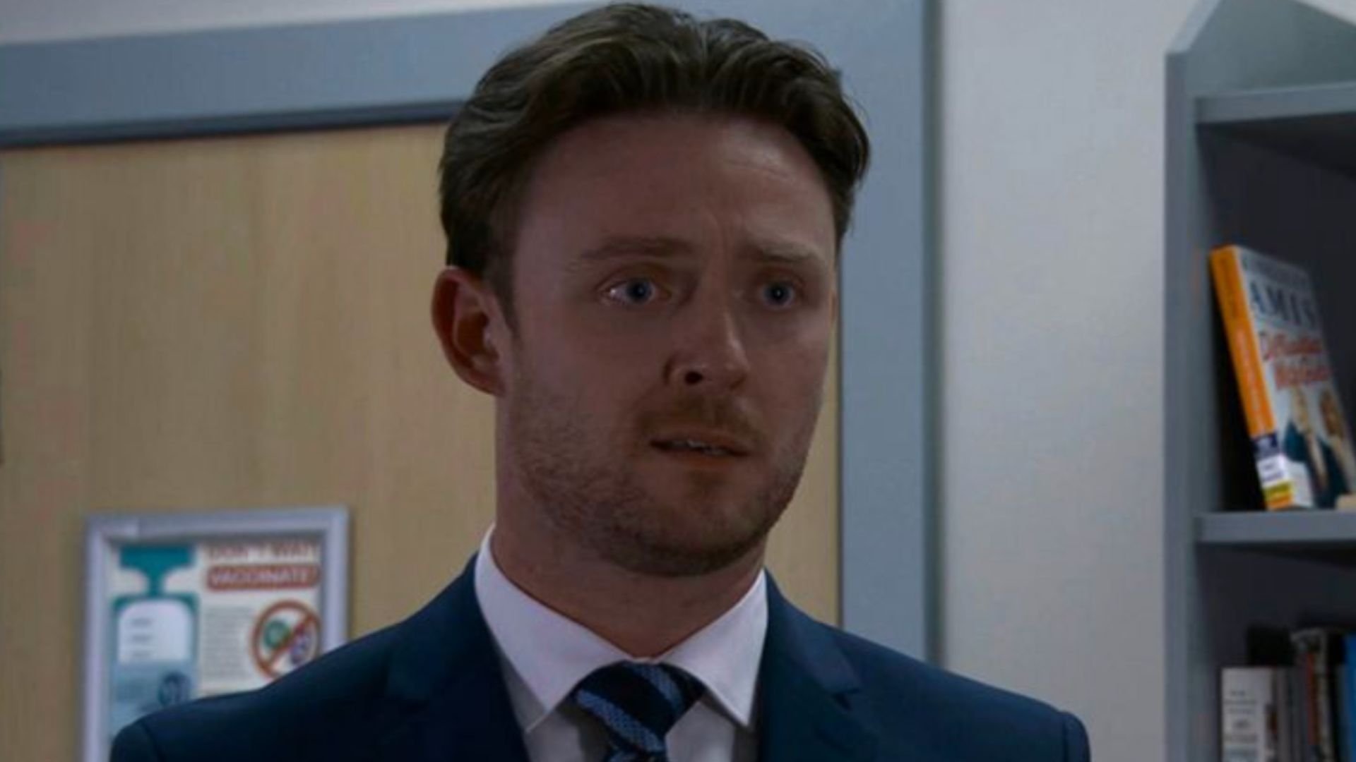 Joel tries covering all angles on Coronation Street | Image Source: ITV