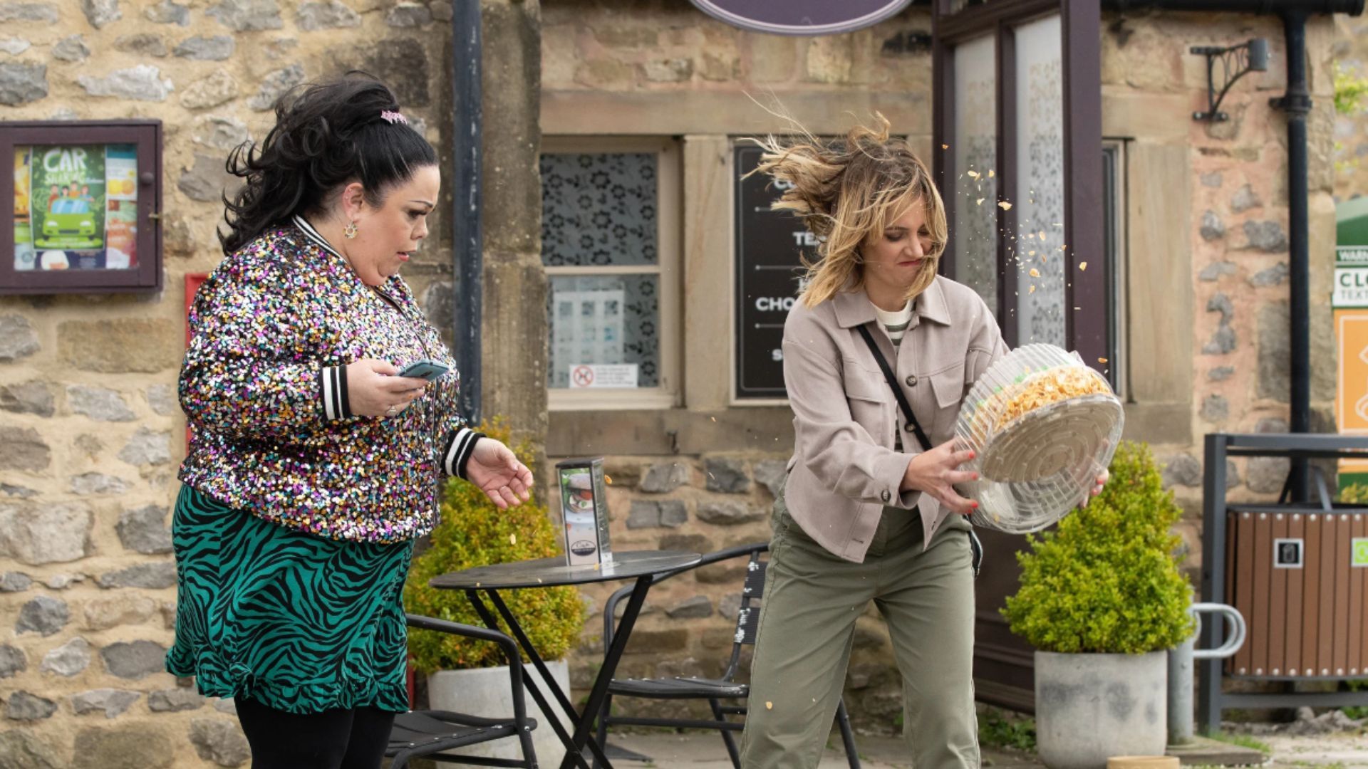 Gabby smashes her birthday cake out of Mandy&#039;s hands on Emmerdale | Image Source: ITV