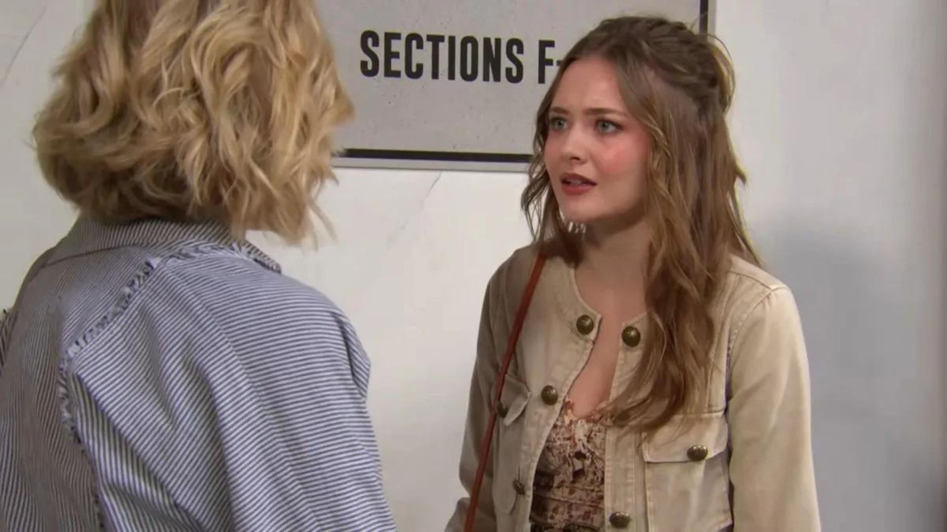 Faith scolds Lucy for drinking at a concert on The Young and the Restless | Image Source: CBS