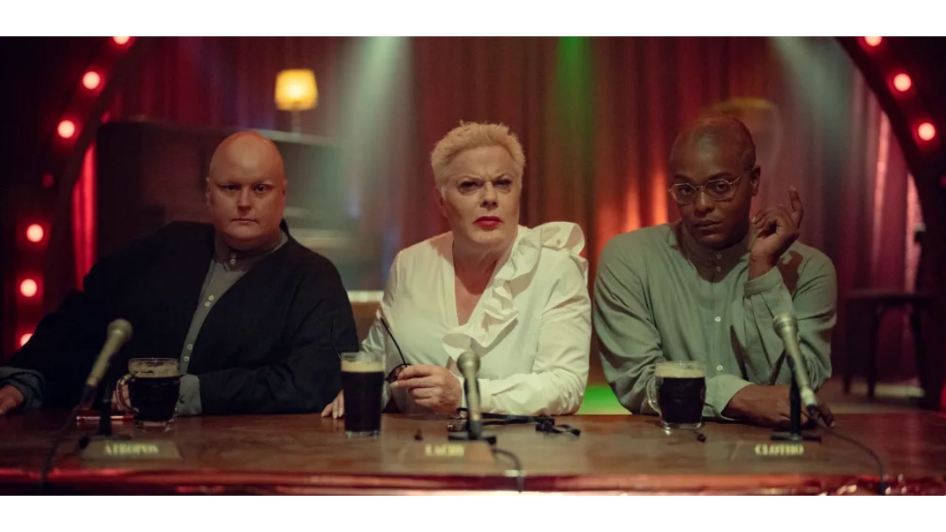 Sam Buttery, Suzy Eddie Izzard and Ch&eacute; in KAOS (Image via Netflix)