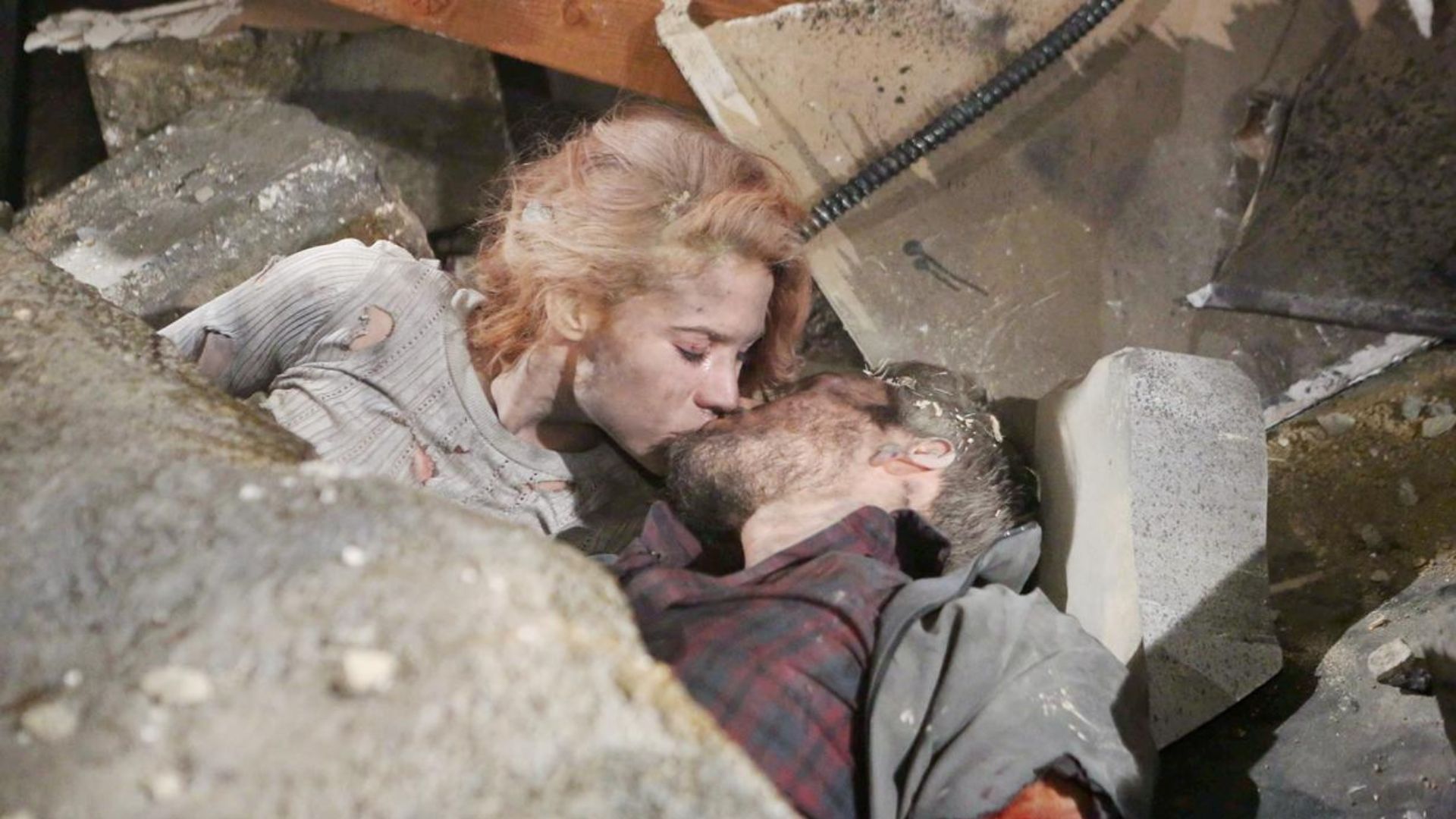 Sally and Liam kiss in the rubble on The Bold and the Beautiful | Image Source: CBS