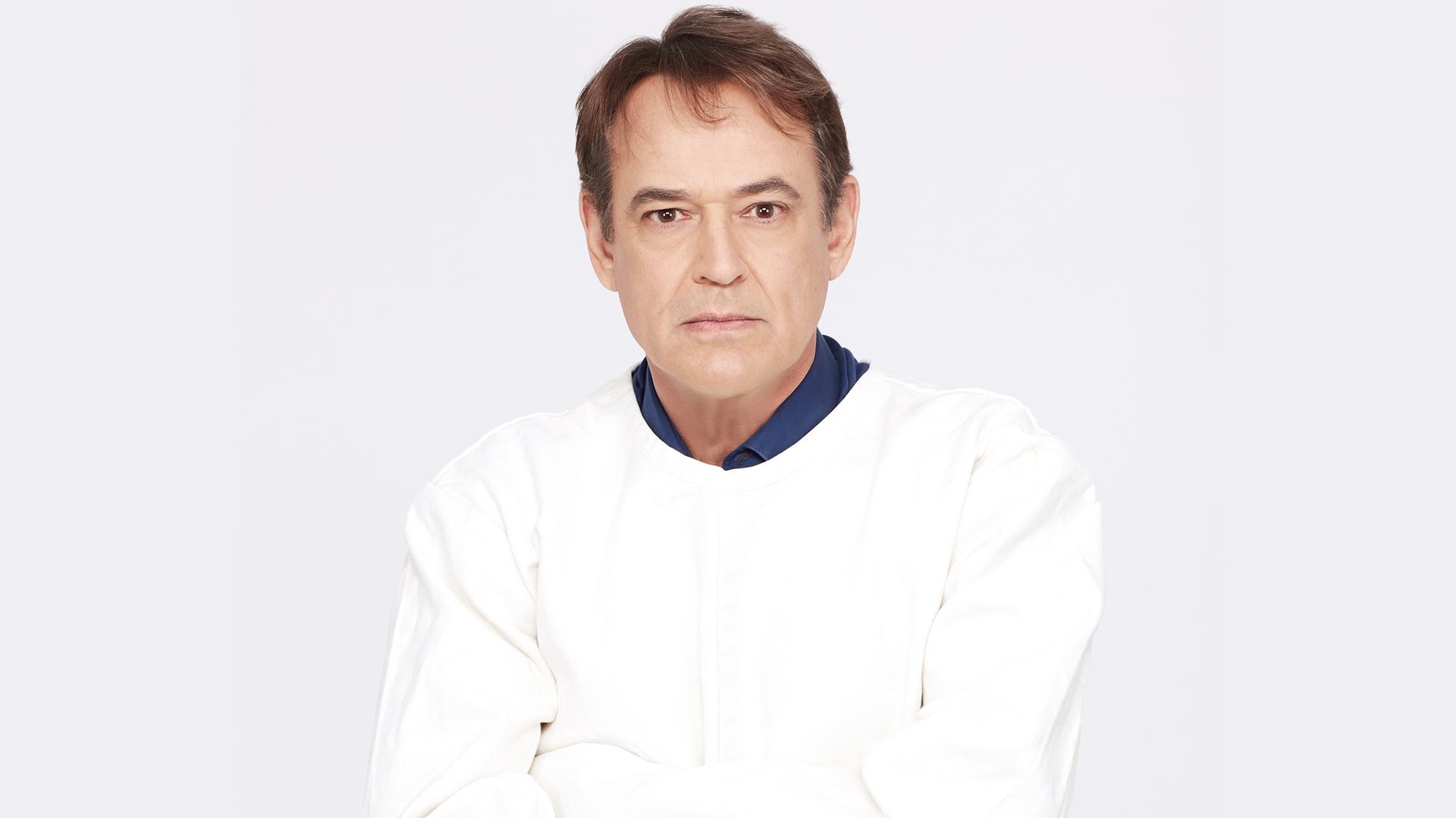 Jon Lindstrom as Ryan Chamberlain, looking serious.