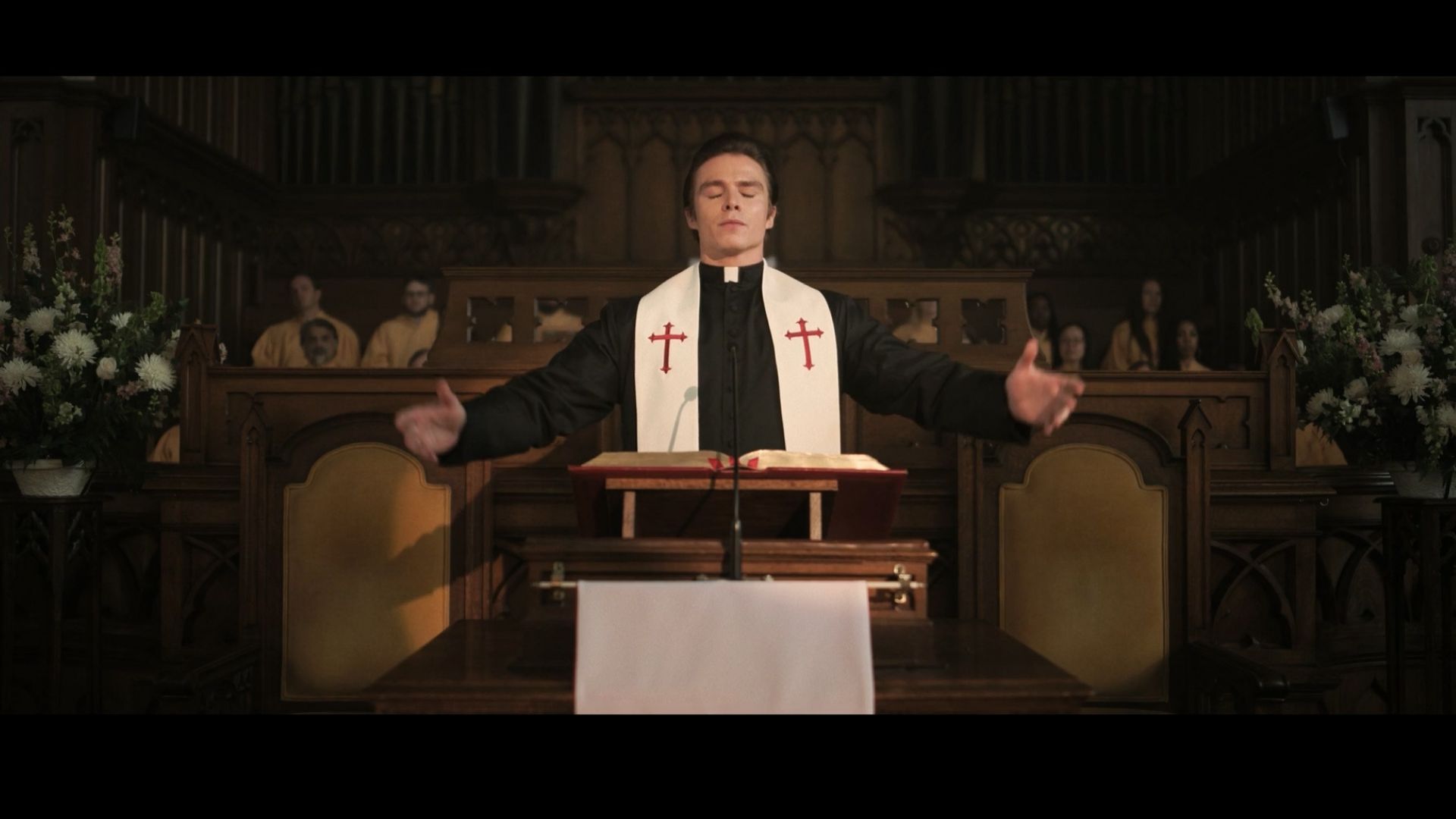 Nicholas Chavez as Father Charlie (Image Source: FX)