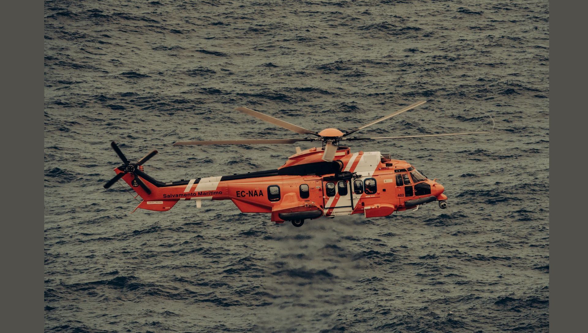 A Rescue Helicopter over the Sea Water (Image via Pexels)