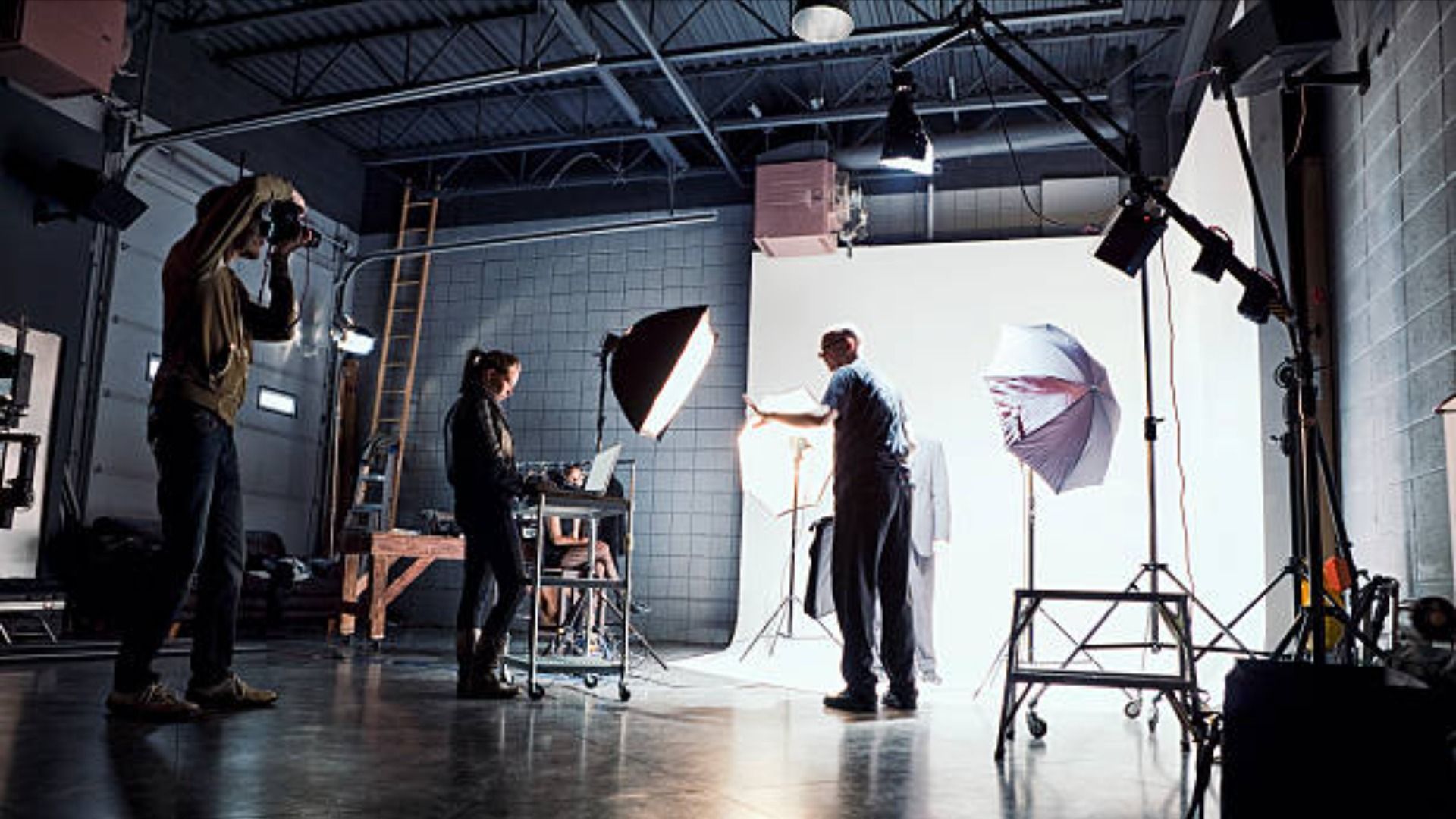 Film crew working on a set / Image Source: Getty