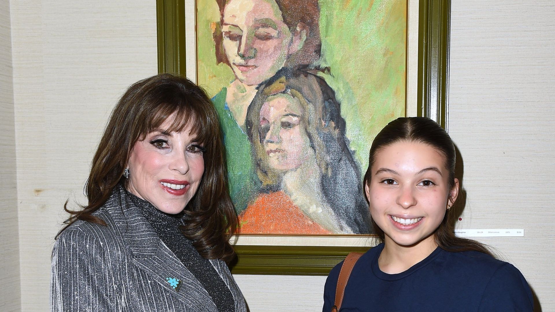 Kate Linder smiles with Stella Parsons, who purchased art by Molly Wolveck | Image source: JPI