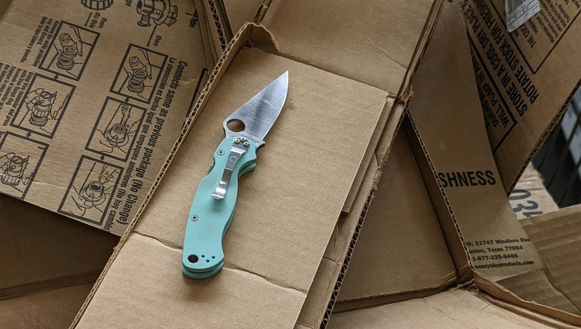 Pocketknife on Cardboard (Image via Pexels)