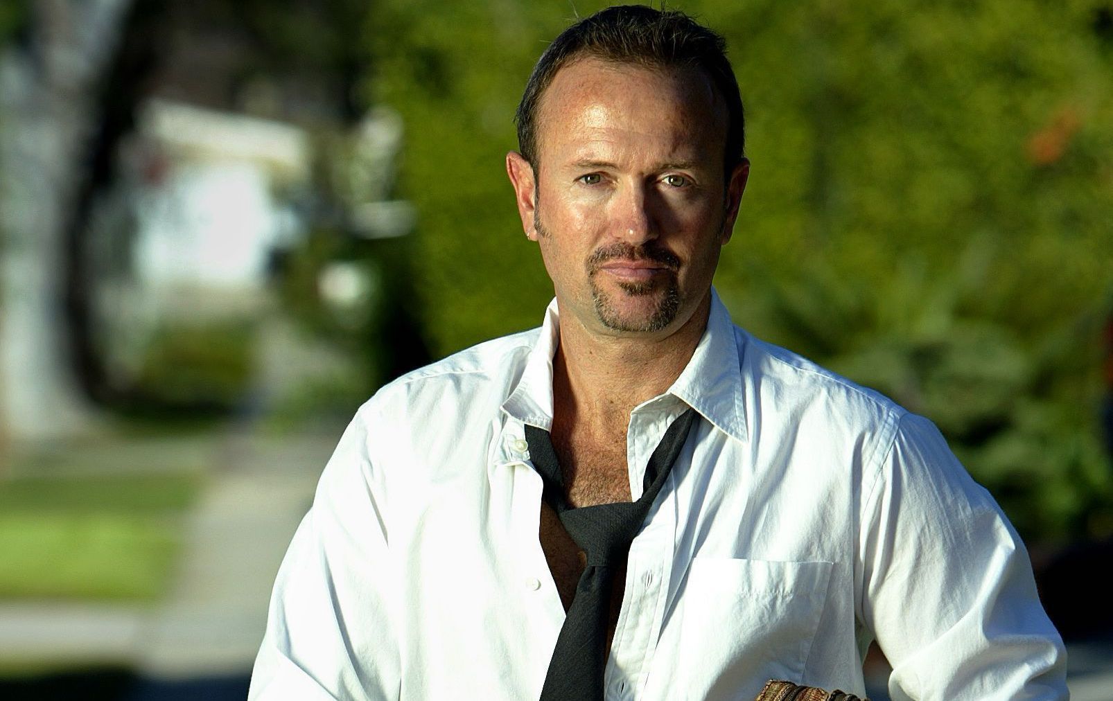 C. Jay Cox, writer/director of Latter Days, outside his Los Angeles home. (Image via Getty/Mel Melcon)