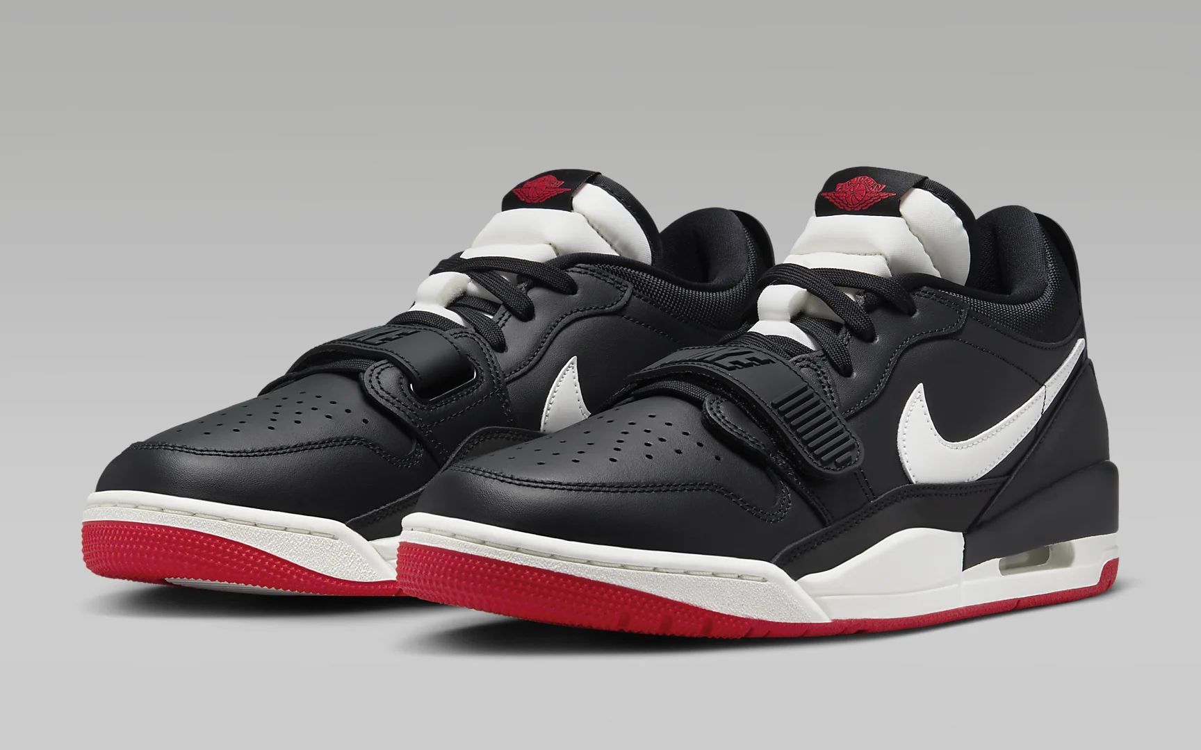 Air Jordan Legacy 312 Low in Black/ University Red/ Sail (Image via Nike)