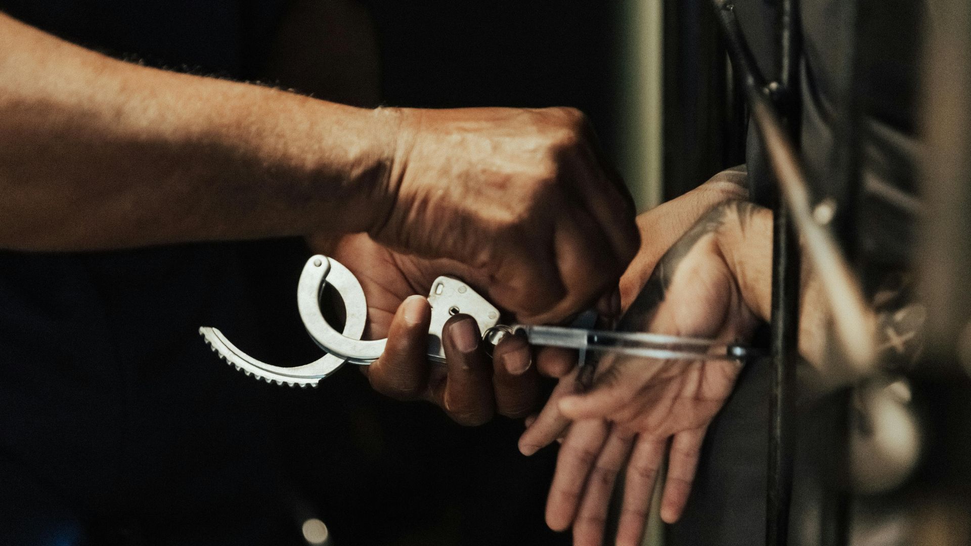 Man getting arrested (Image via Pexels/Ron Lach)