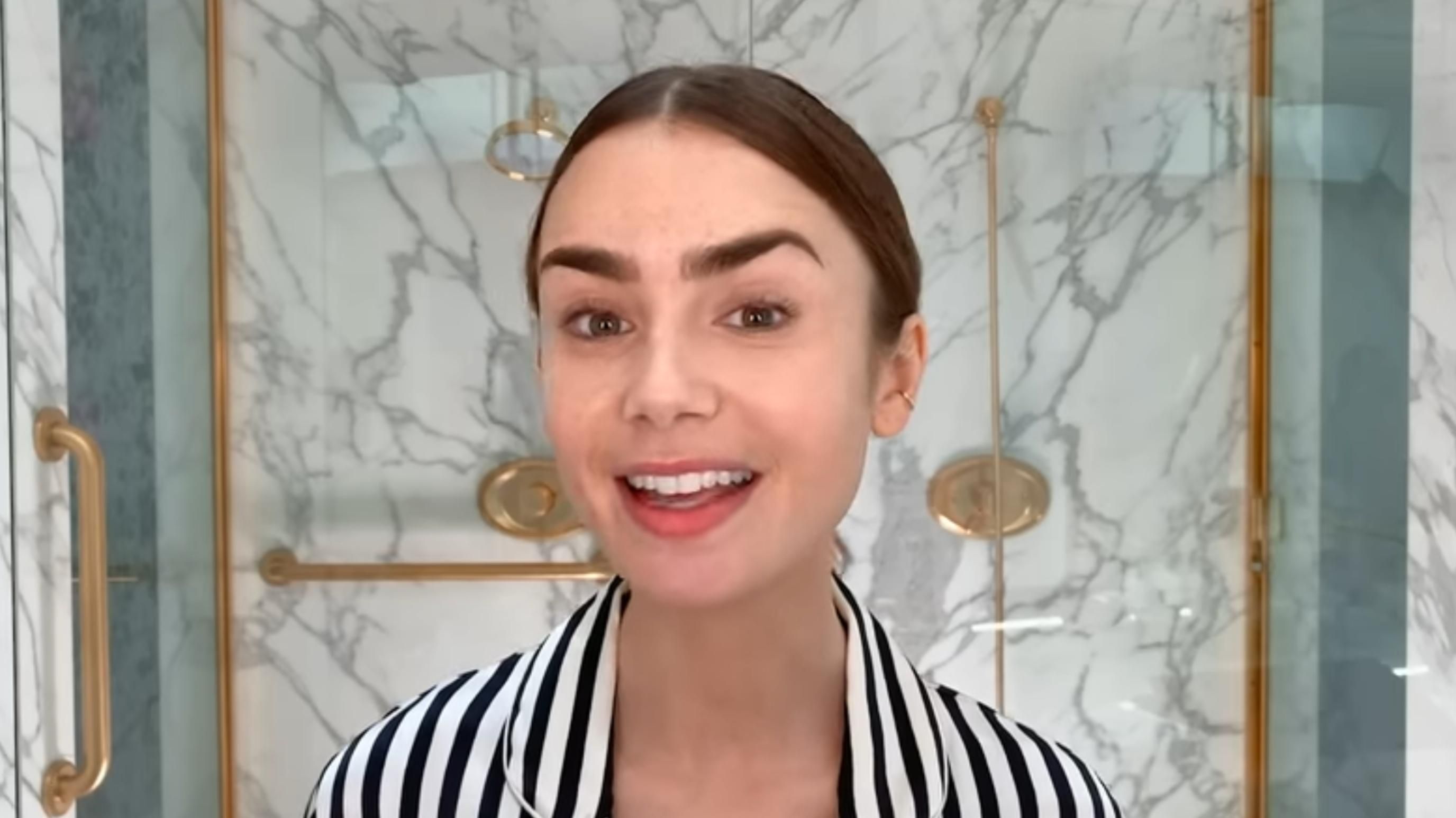 Lily Collins | Image Source: Vogue via YouTube