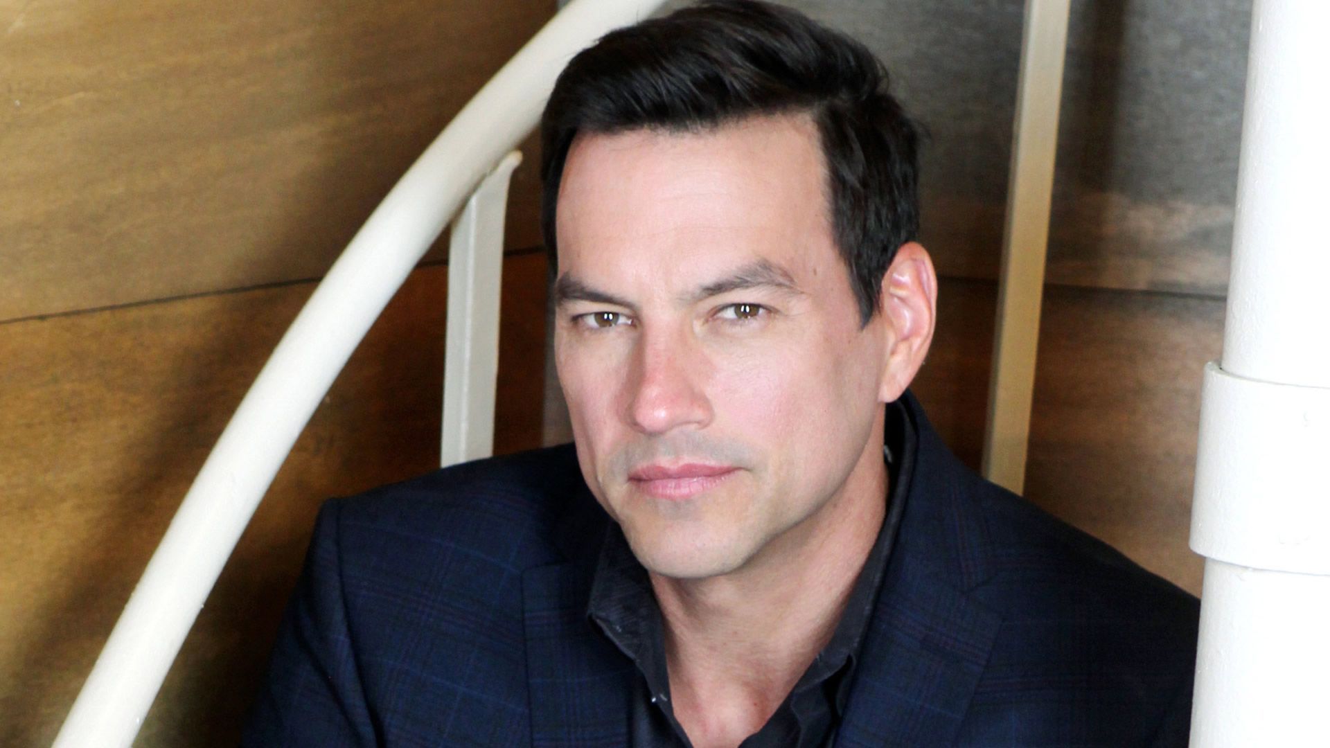 General Hospital&rsquo;s Tyler Christopher smirking. | Image Source: JPI