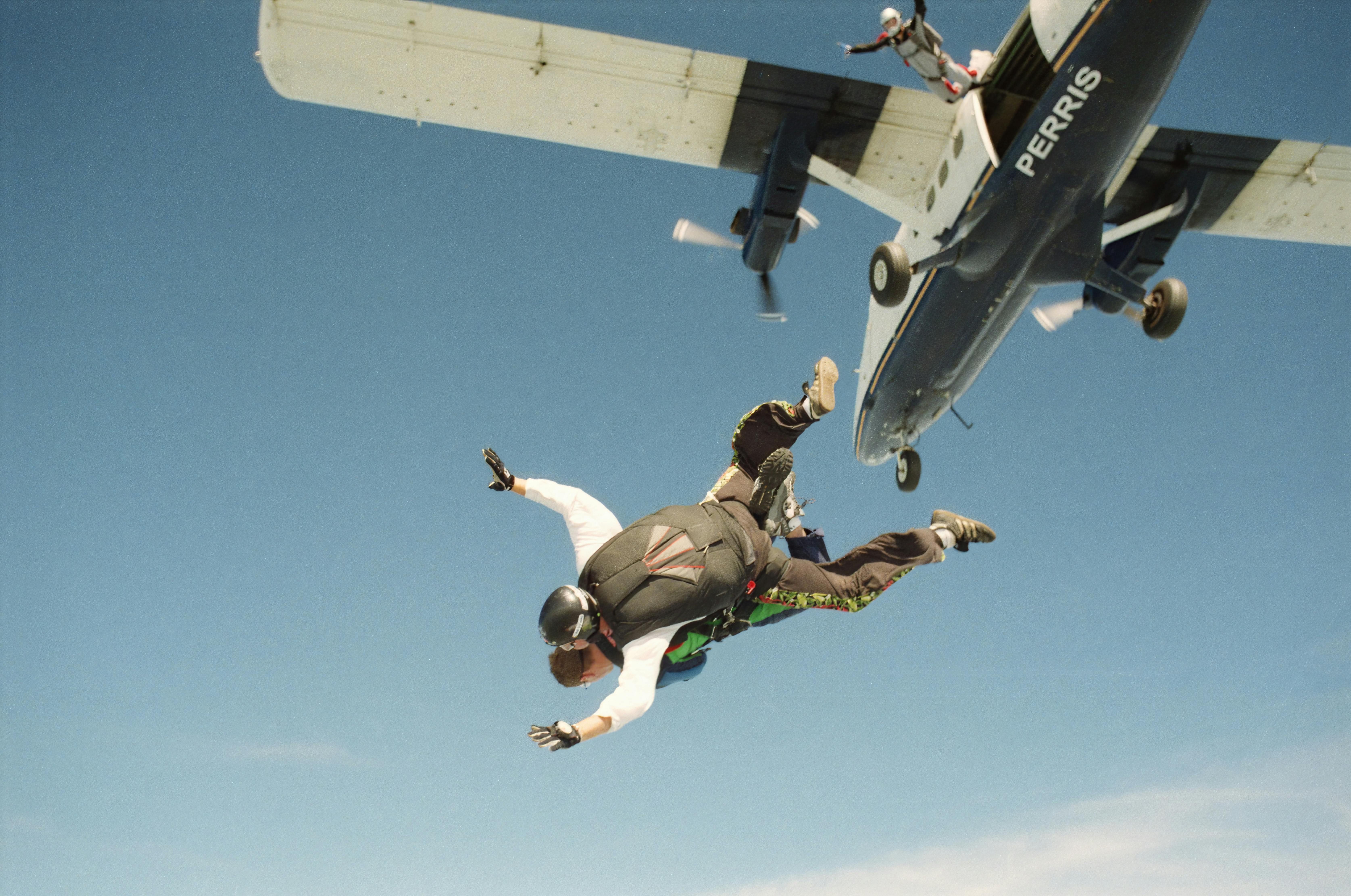 Photograph of Men Skydiving (Image via Pexels)