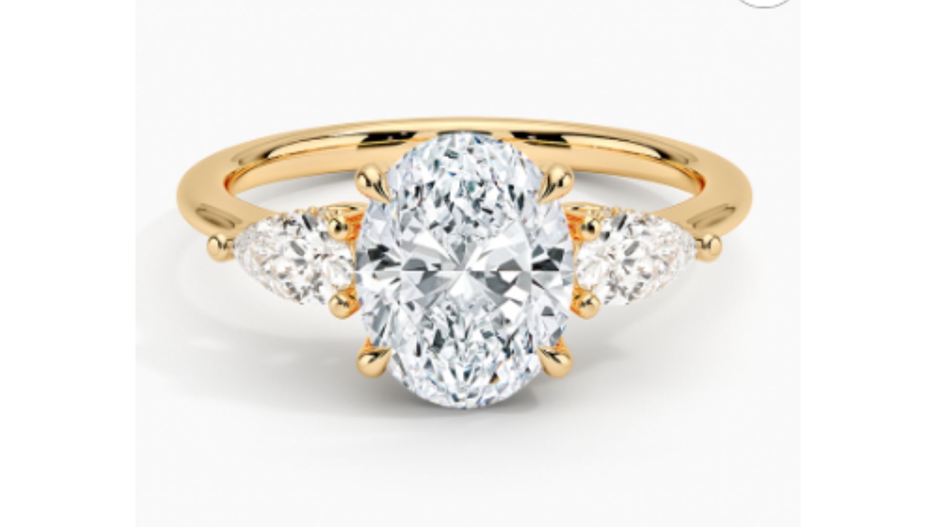 Adorned Opera Three-Stone Diamond Ring (Image via BE)