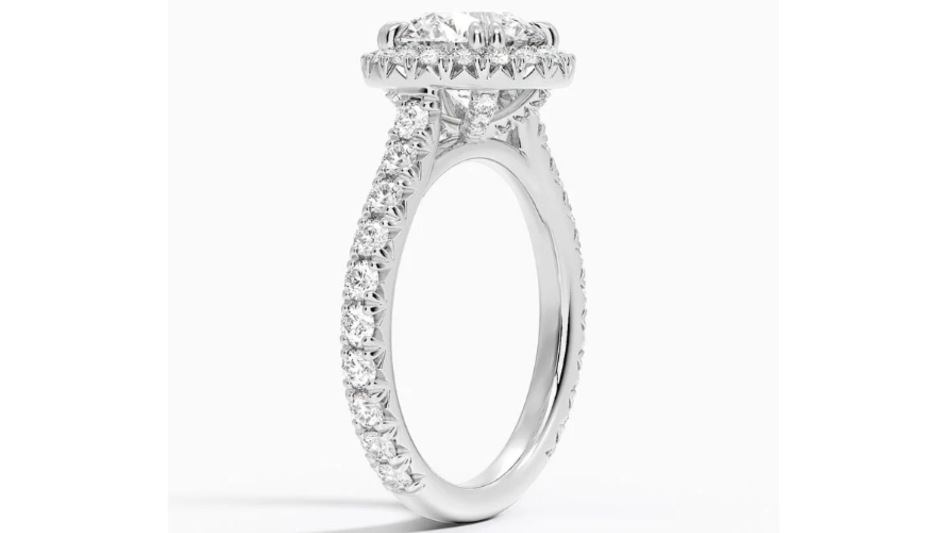 Sienna Halo Three-Quarter Coverage Diamond Engagement Ring (Image via BE)