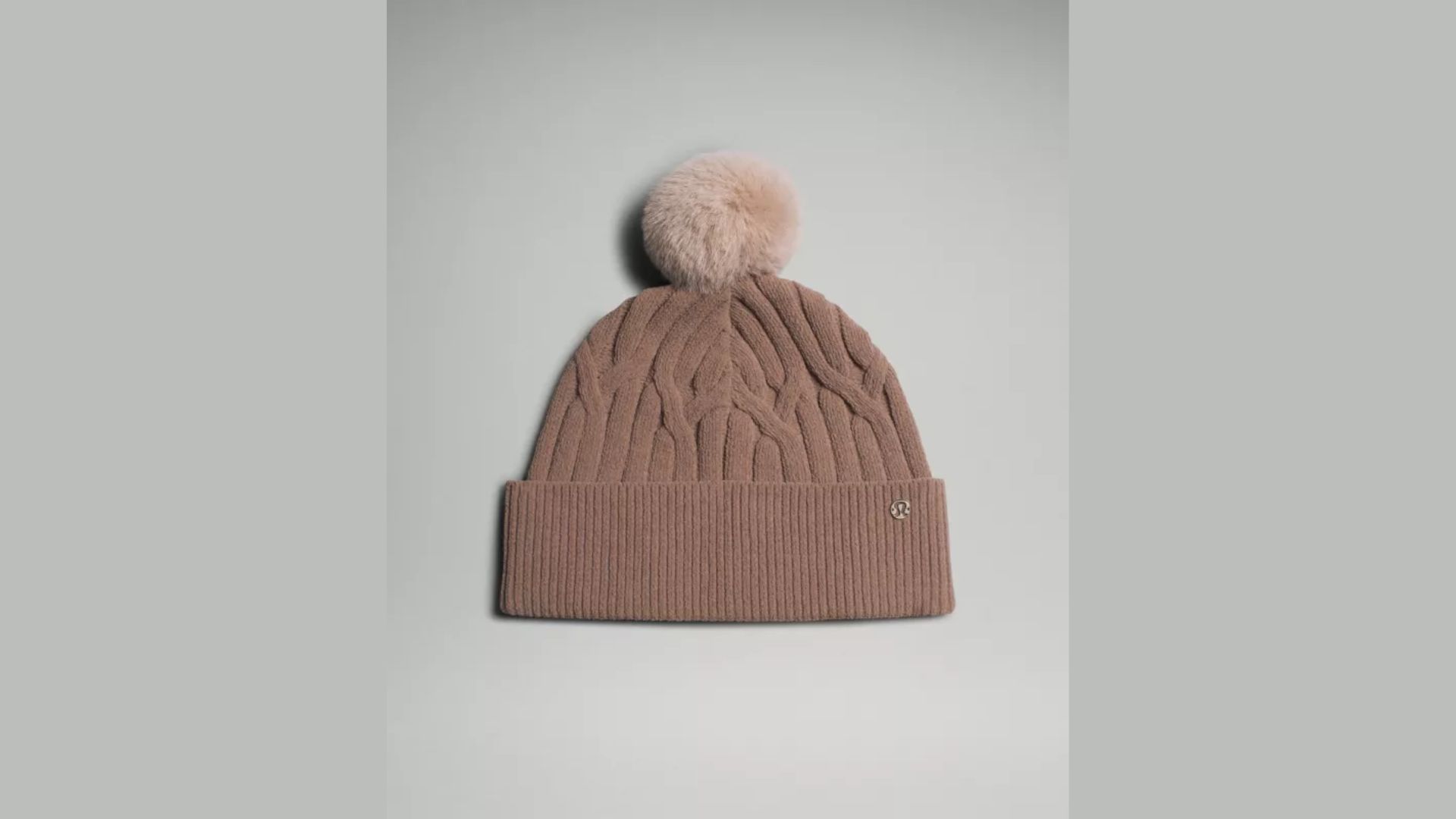 Women&#039;s Cable Knit Pom Beanie (Image via Lululemon)