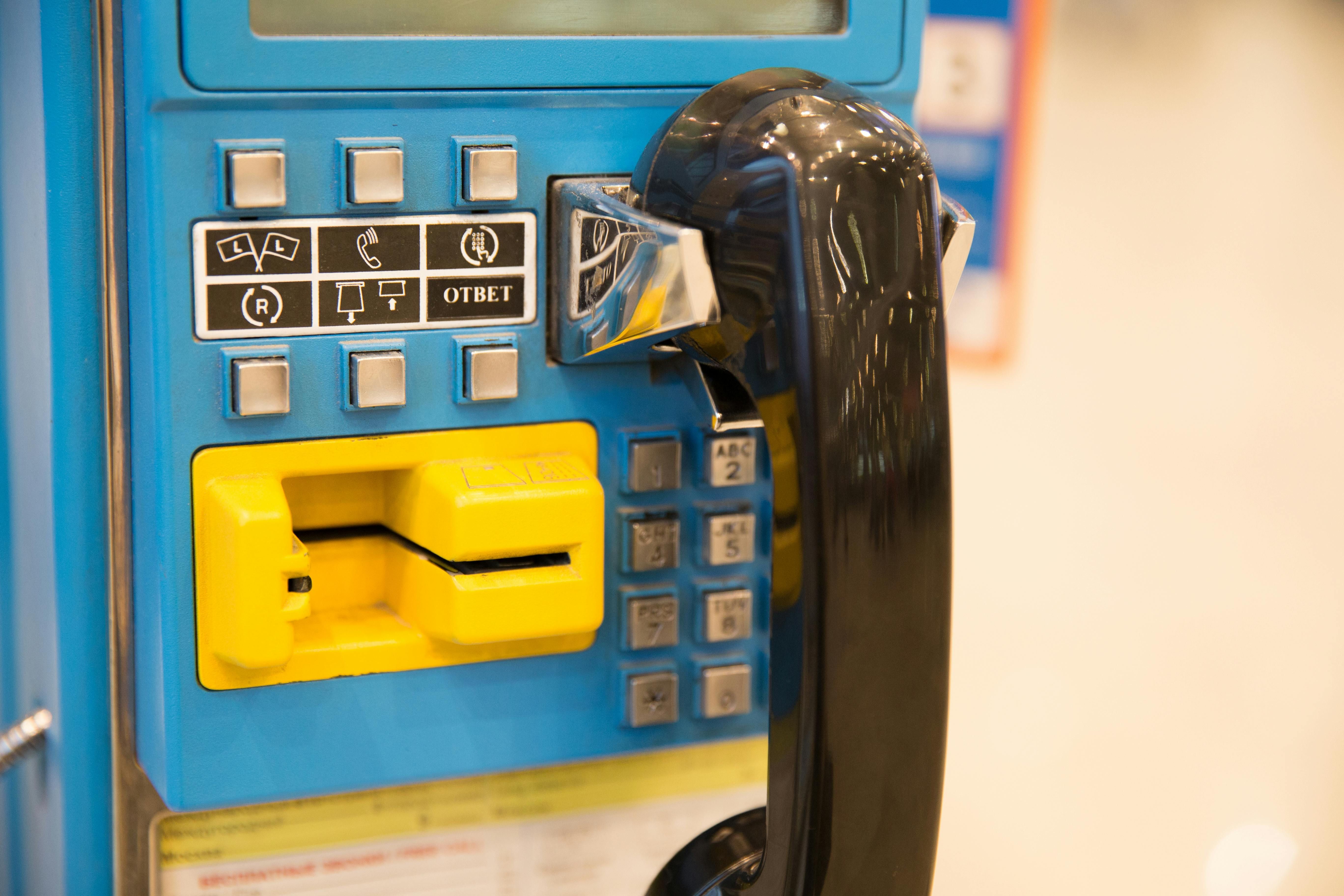 Telephone in a Booth (Image via Pexels)