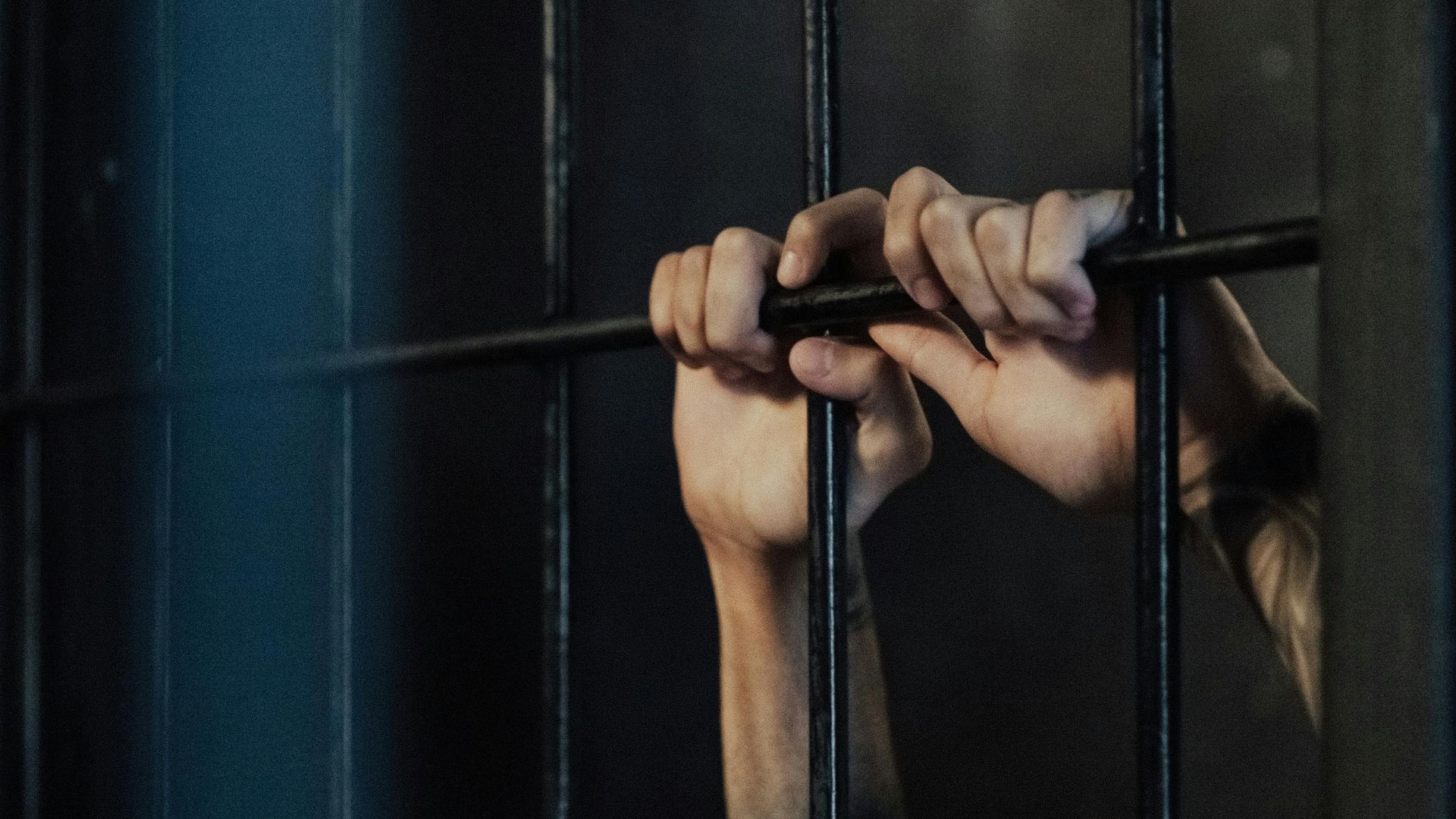 A person in prison (Image via Pexels/Ron Lach)