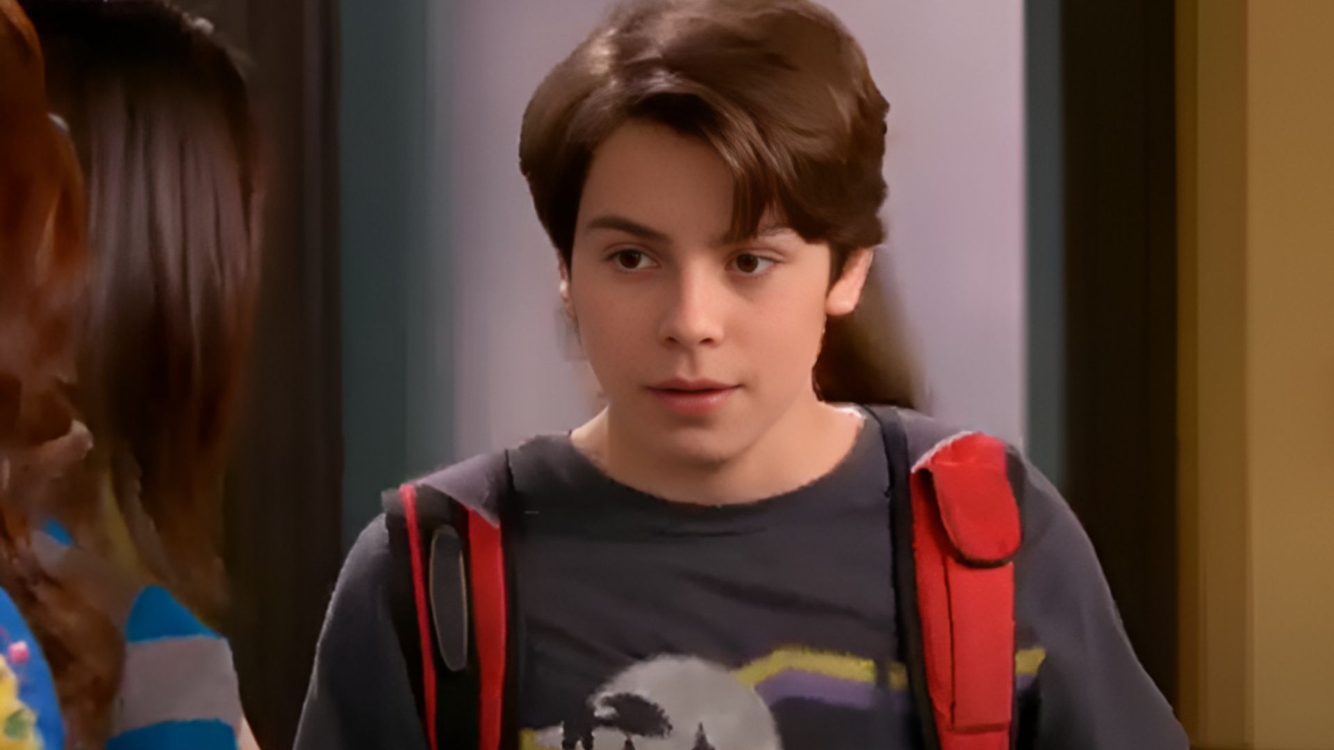 Jake T. Austin as the youngest Russo in the old series (Image Source: Disney)