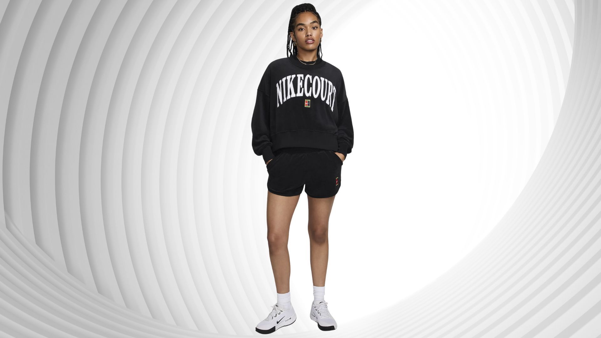 NikeCourt Heritage Women&#039;s Over-Oversized Crew-Neck Graphic Tennis Sweatshirt at 14% off (Image via Nike)