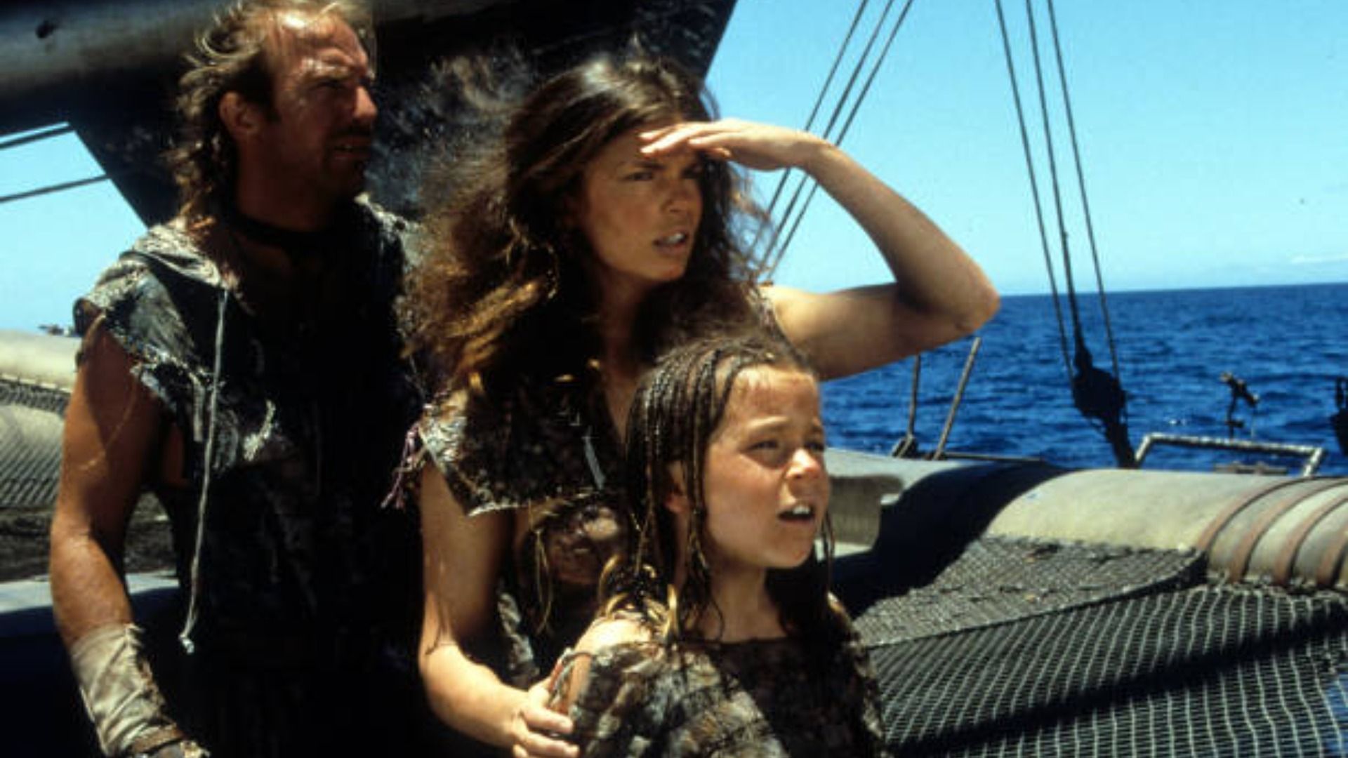 Kevin Costner And Jeanne Tripplehorn In &#039;Waterworld&#039; / Image Source: Getty