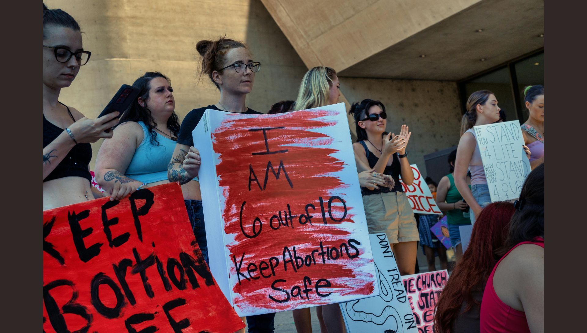 Women with Banners on Feminism Related Protest (Image via Pexels) 