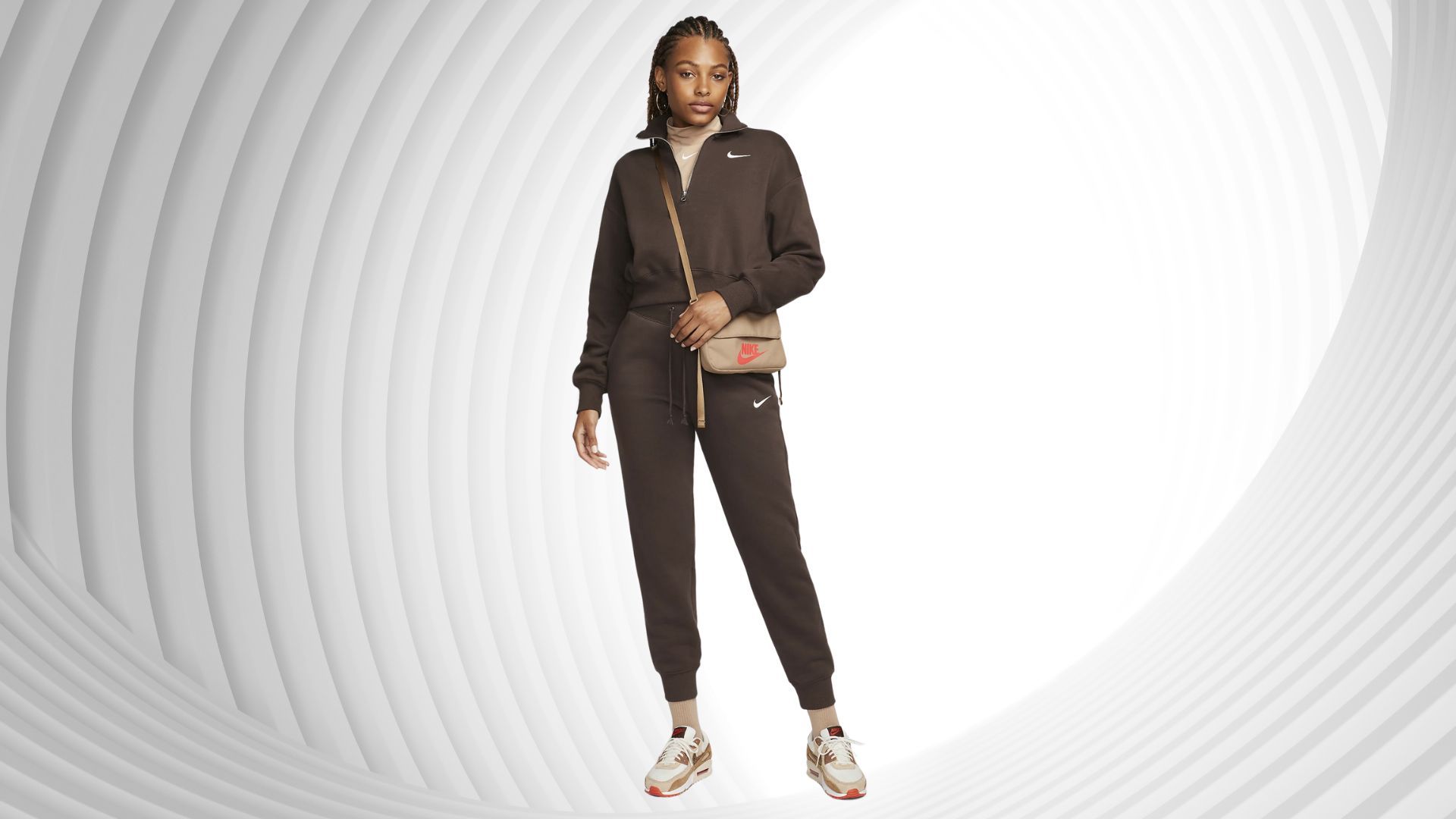 Nike Sportswear Phoenix Fleece Women&#039;s 1/2-Zip Cropped Sweatshirt at 14% off (Image via Nike)