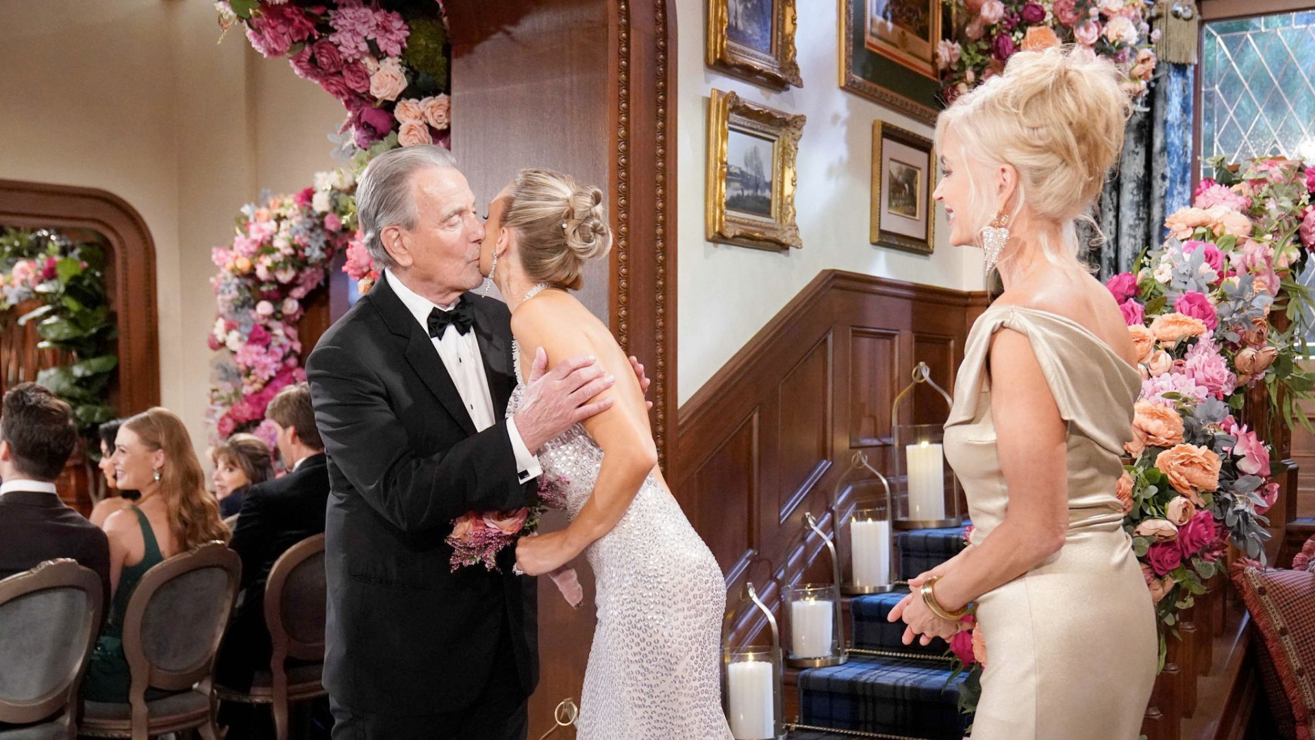 Ashley and Victor walk Abby down the aisle | Image source: JPI