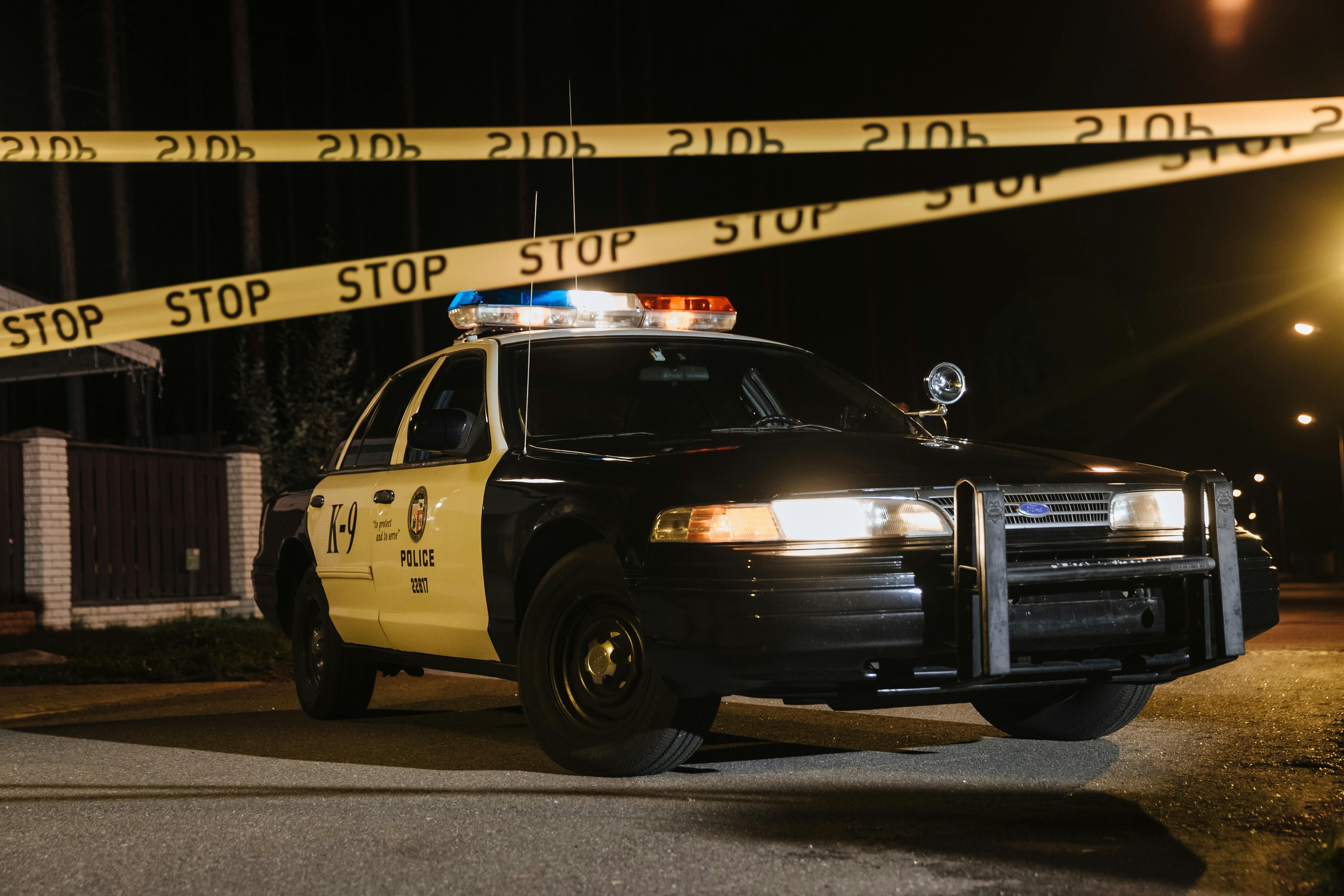 Image of police car in crime scene (Image via Cottonbro Studio / Pexels)