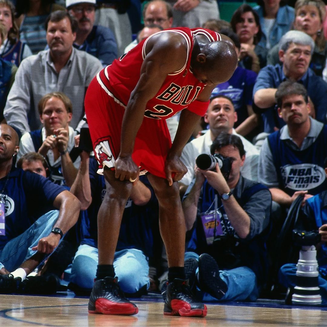 MJ wearing the Air Jordan XII Black/Varsity Red in Utah in 1997 (Image via Nike)