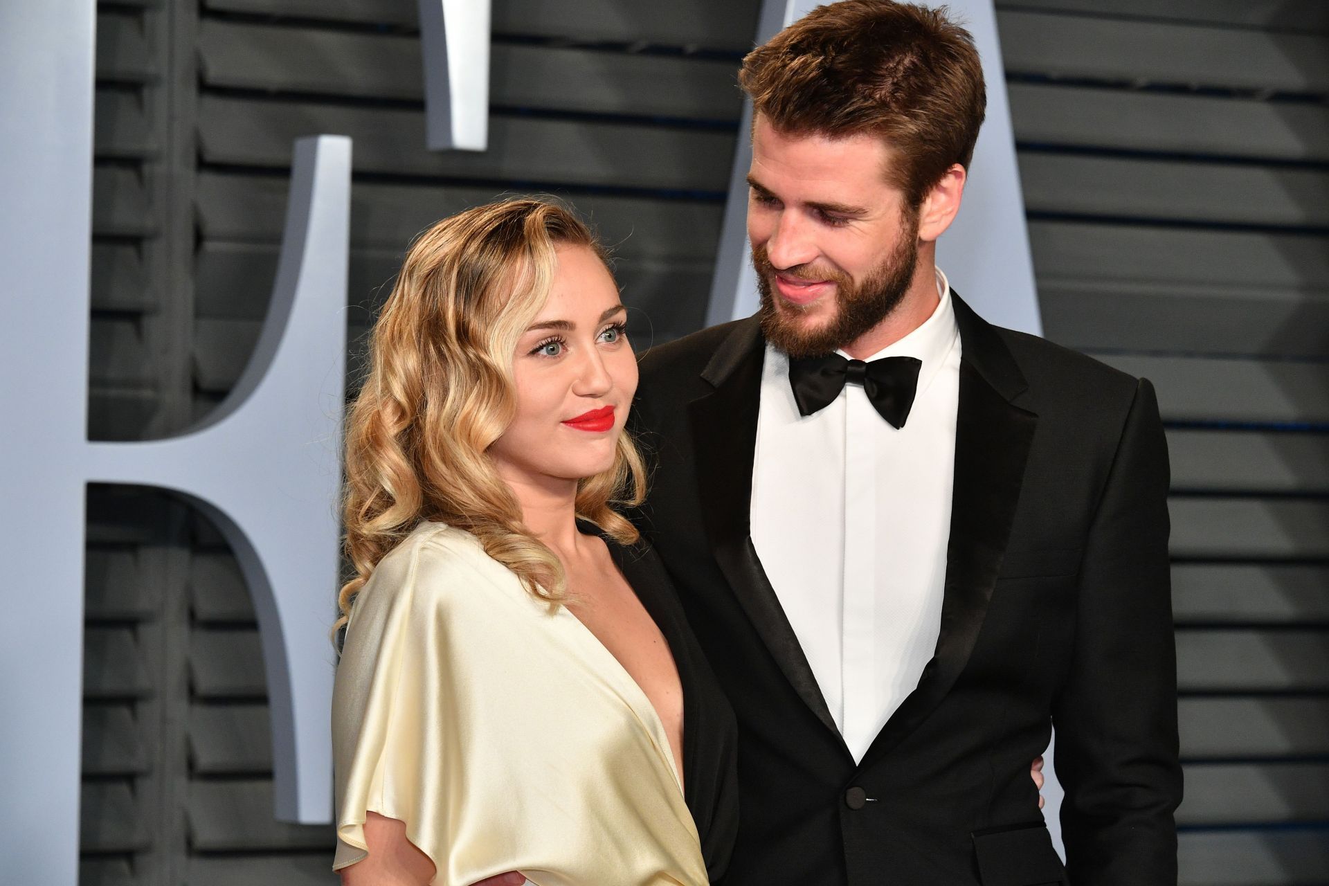 Miley Cyrus and Liam Hemsworth (Photo by Dia Dipasupil/Getty Images)