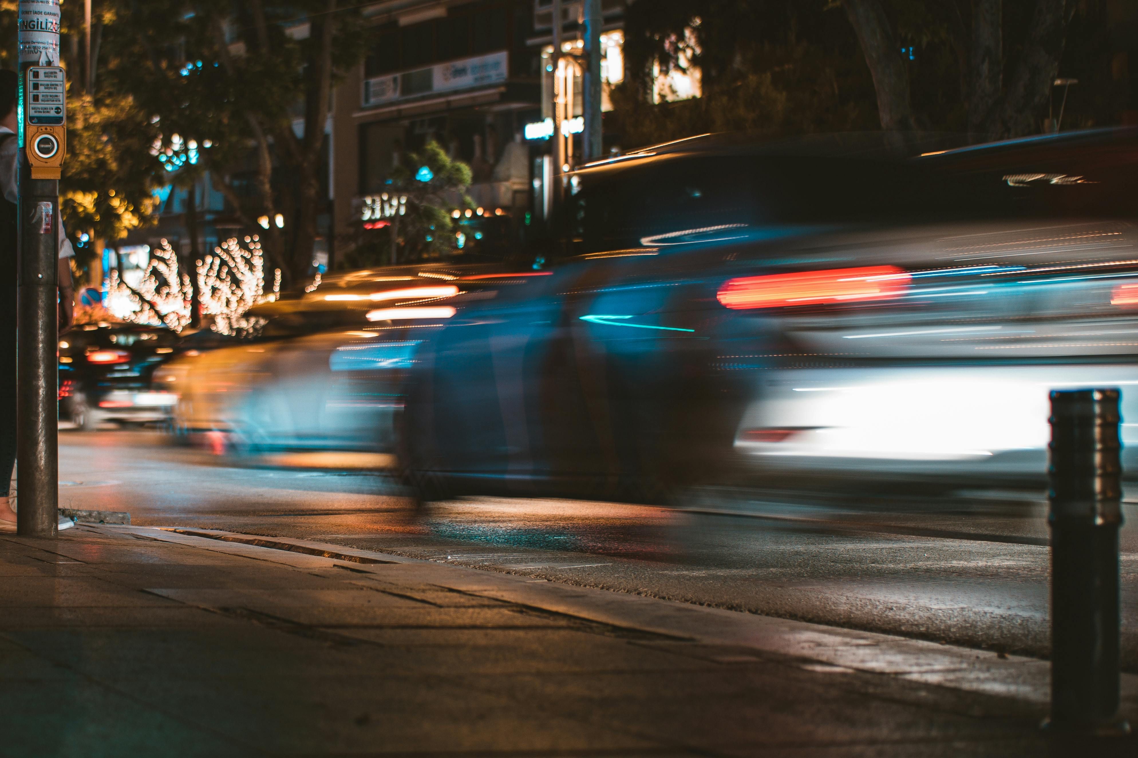 Time-lapse Photography of Silver Car Passed by on Road (Image via Pexels)