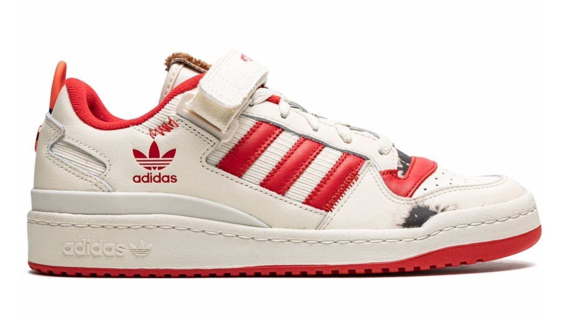 Adidas x Home Alone Forum Low sneakers (Image via Farfetch)