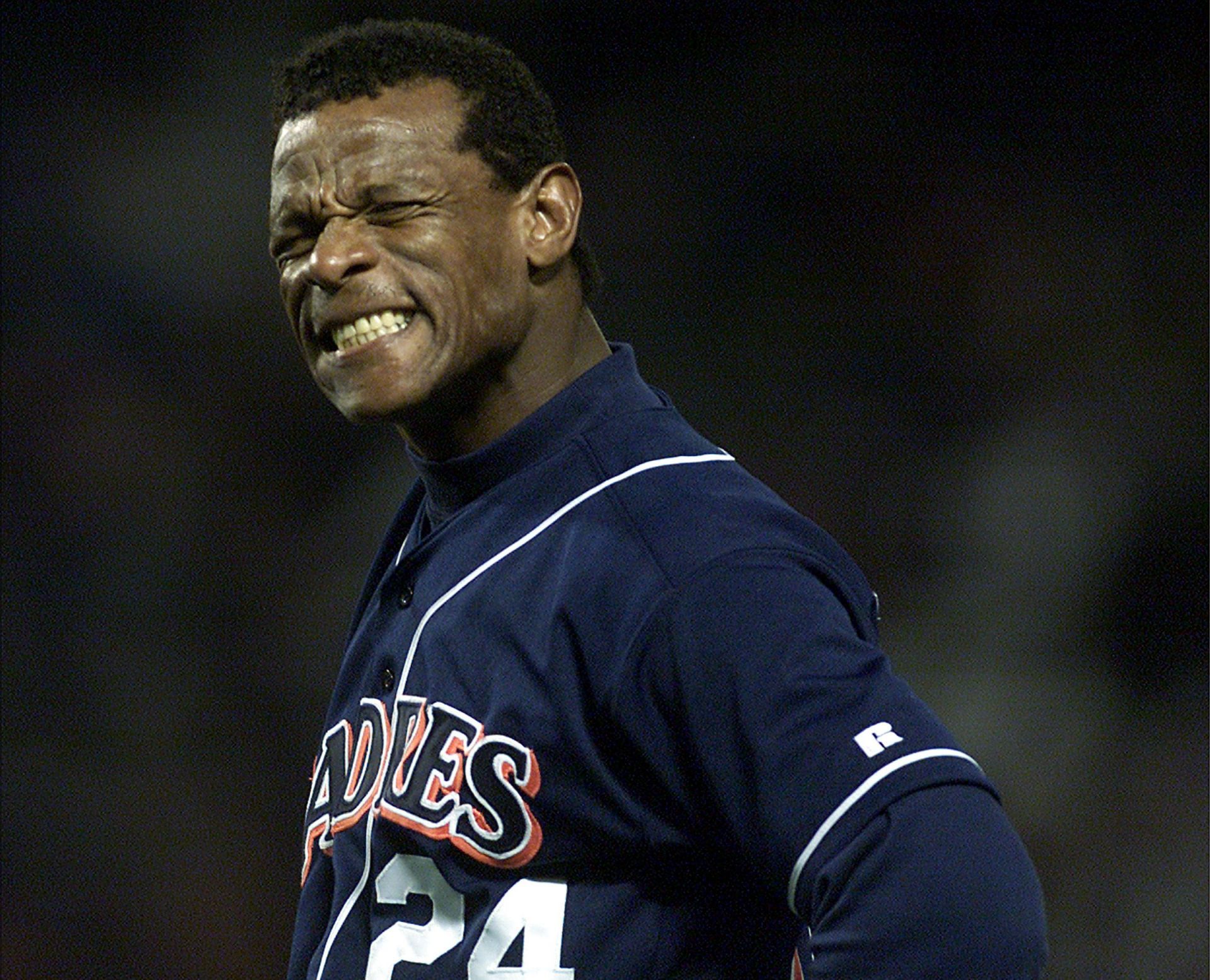 Padres outfielder Rickey Henderson grimaces after grounding out with two men on to end the fifth inn - Source: Getty