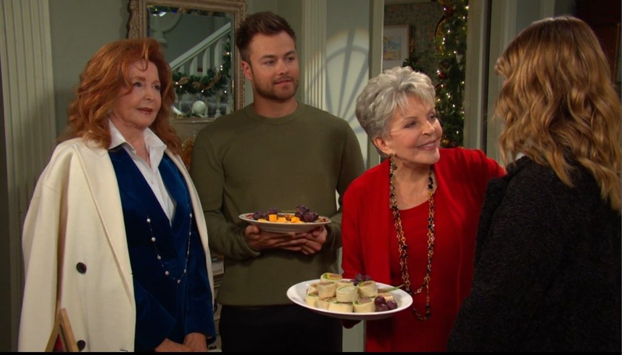 Julie (Susan Seaforth Hayes) introduces Doug III (Peyton Meyer) to more family members.