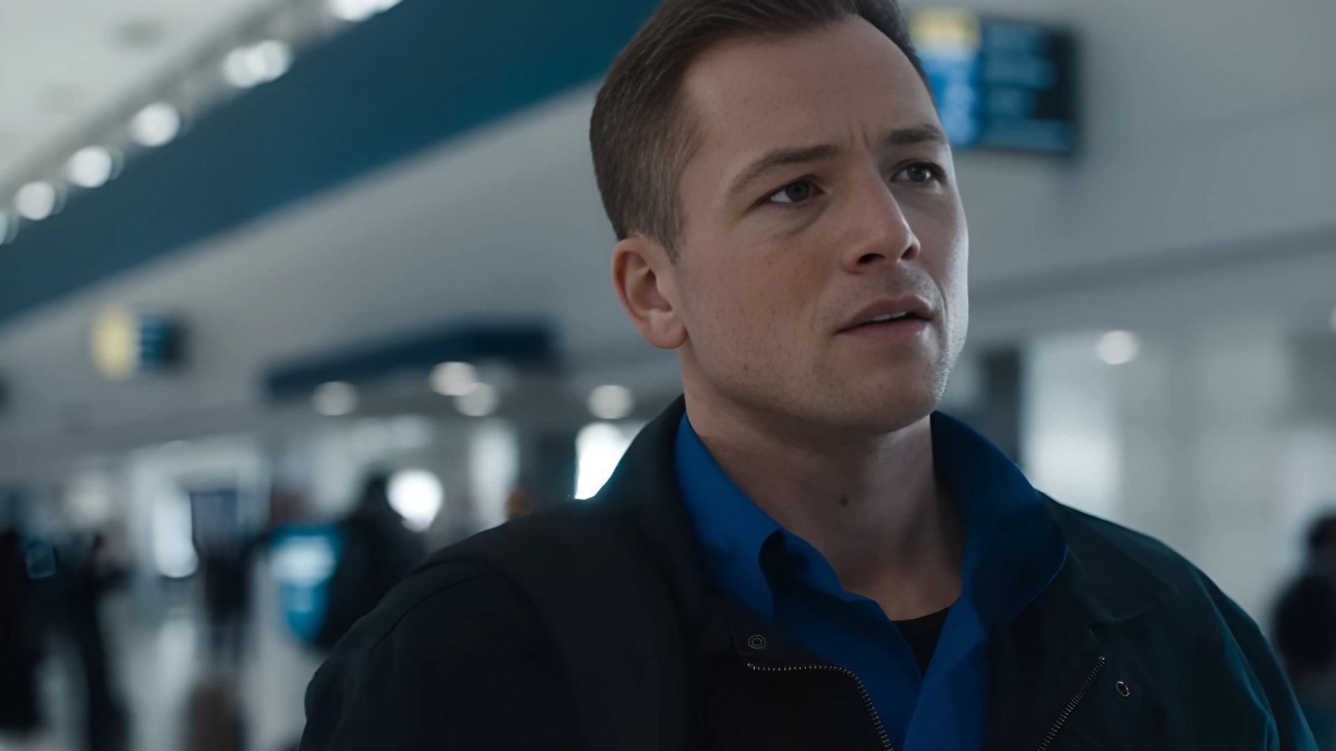 Taron Egerton is looks in an awe.