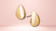 Macy’s Polished Teardrop Dome Stud Earrings in 10k Gold (Image via Macy’s)