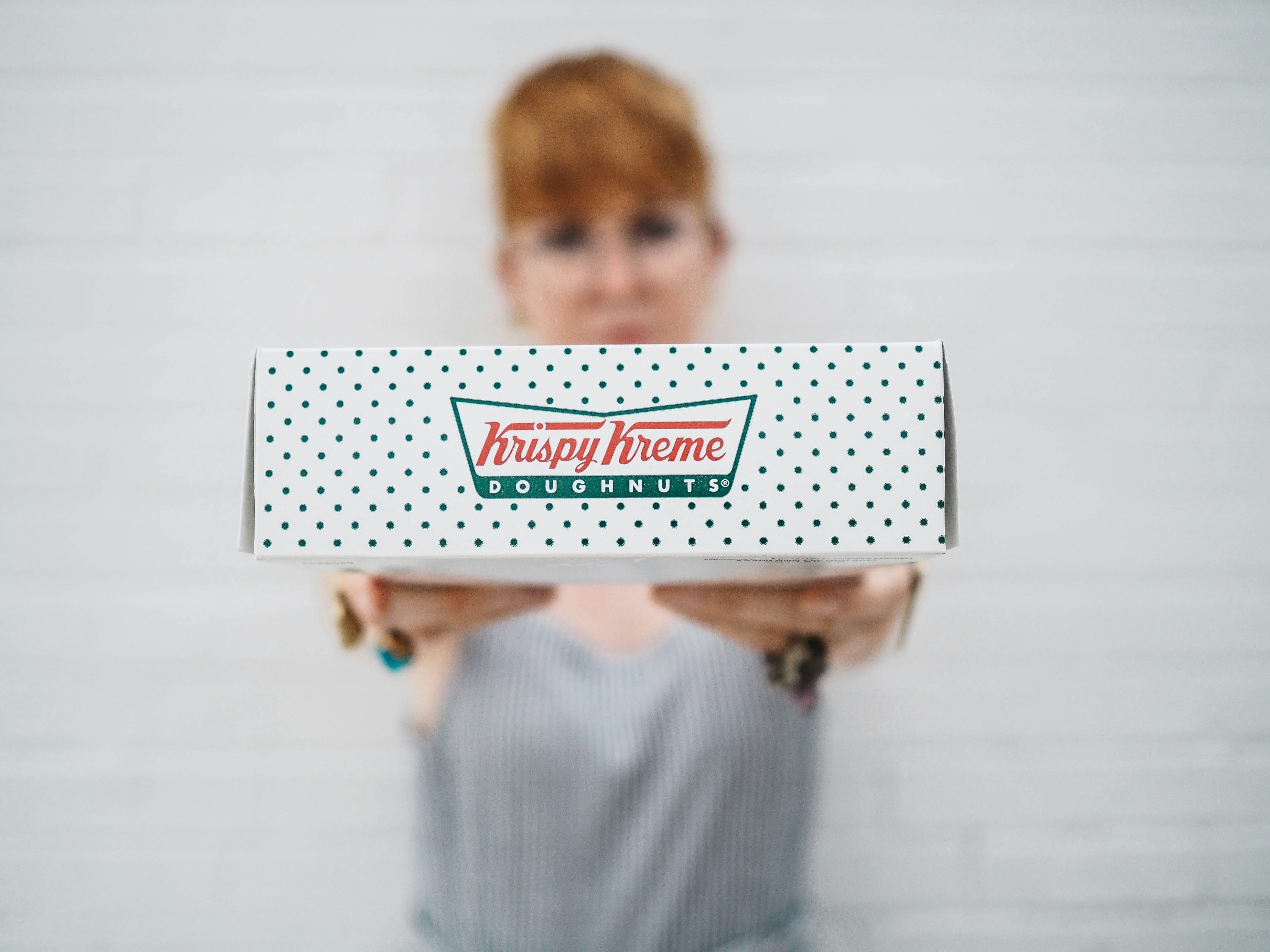 Get the Christmas-themed Krispy Kreme doughnuts at your nearest stores! (Image via Unsplash/ No Revisions)