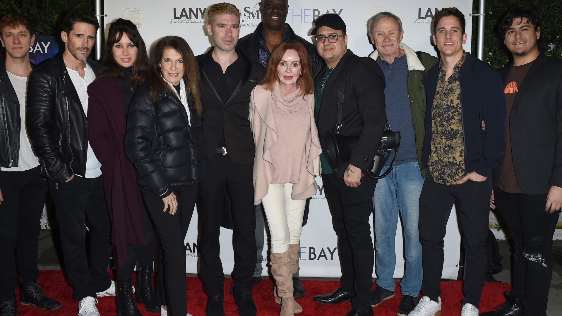 Manning with the cast of The Bay | Image Source: JPI Studios