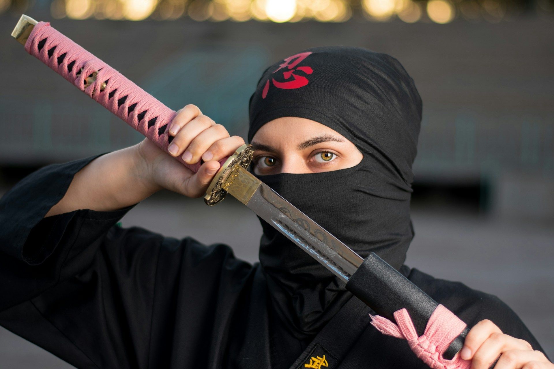 Image of a woman dressed as a Ninja: Image via (Unsplash/ Abolfazl Eslami)