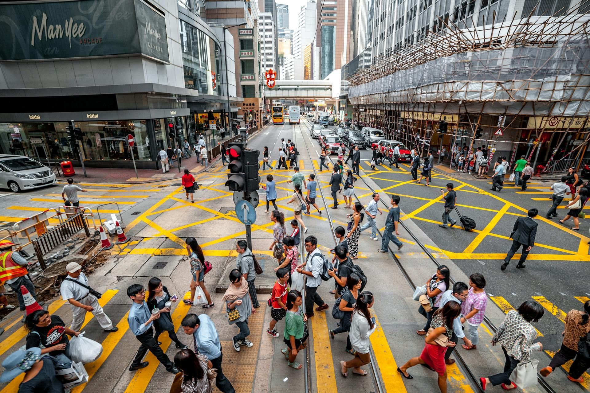 Choose your fighter, morning traffic or walking endless stairs to reach your office. (Image via Pexels/Gije Cho)