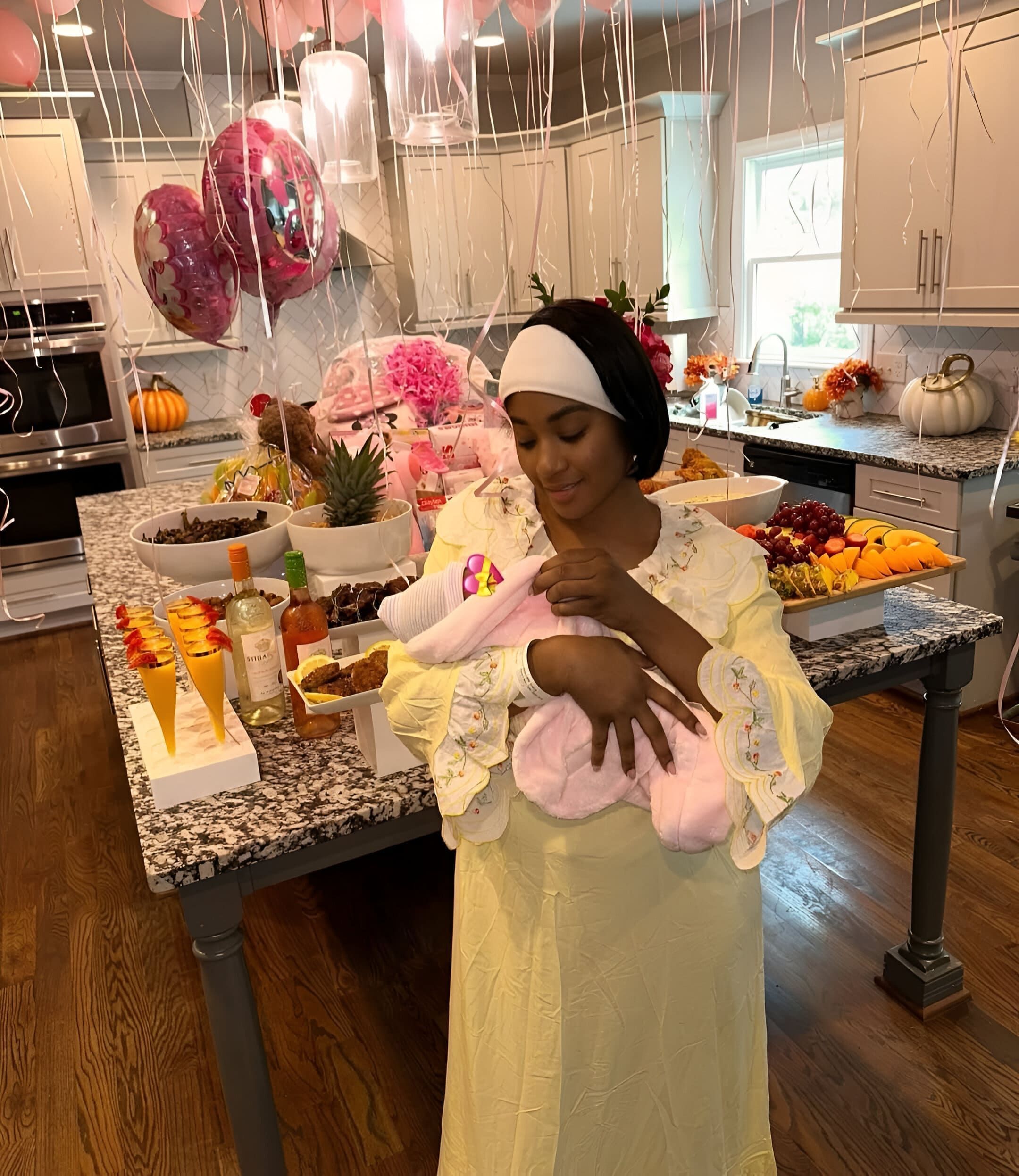 Ti Taylor, shares an image of herself holding her new born baby (Image via Instagram/@titaylor)