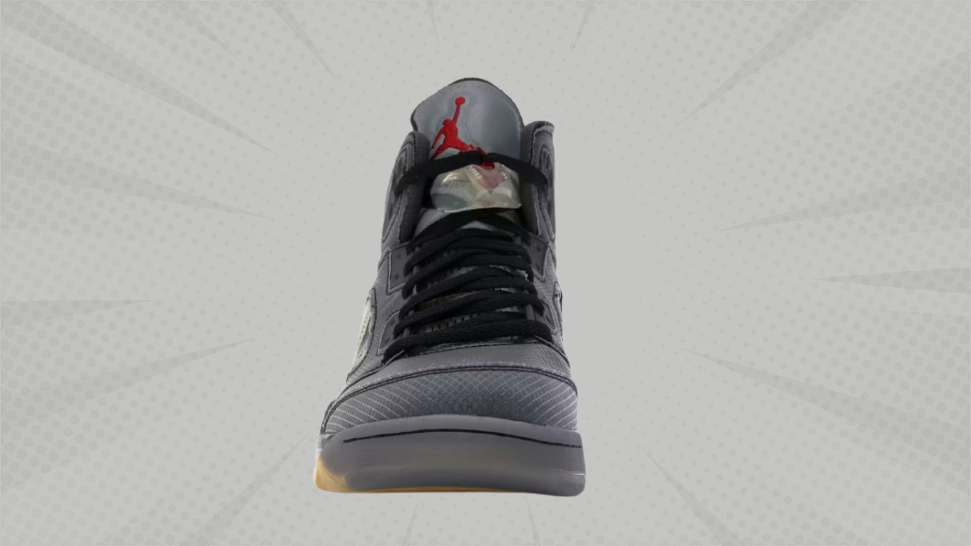 The predominantly grey colorway is accented by the red Jumpman logo on the tongue and black detailing around the shoes (Image via StockX)