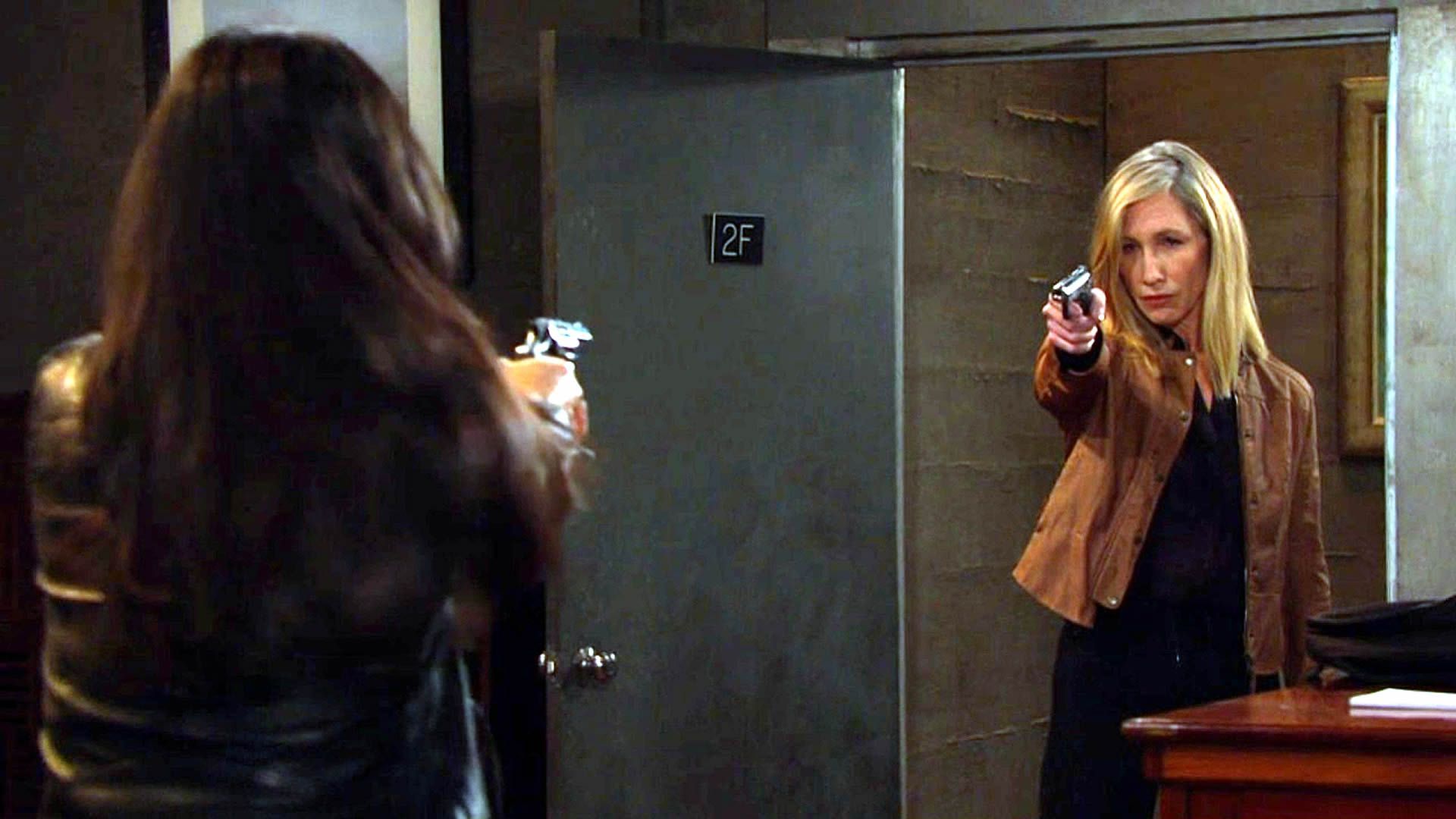 Days of Our Lives&#039; Catherina holding Gabi at gunpoint. | Image Source: Peacock