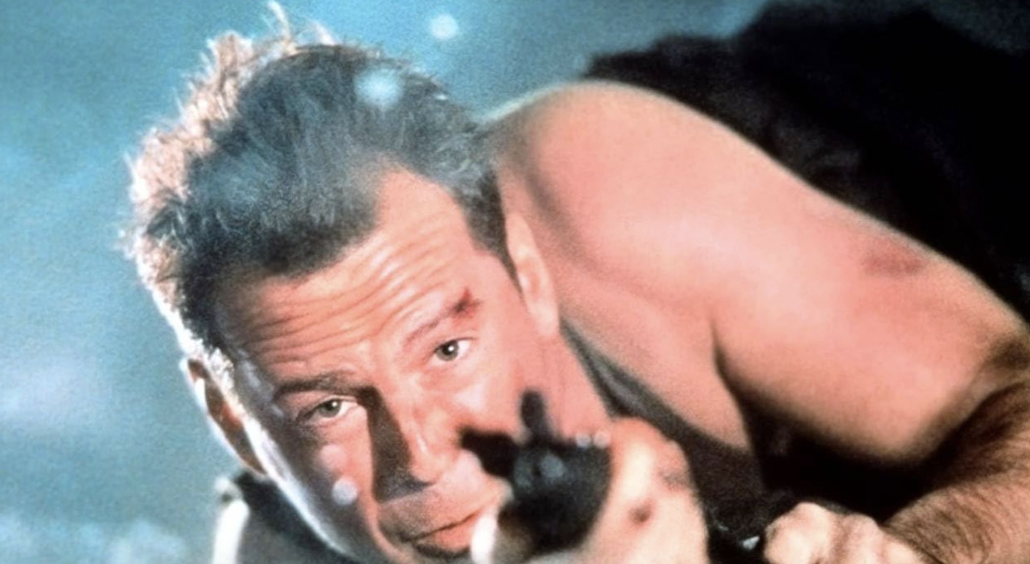 Bruce Willis in Die Hard (Image via 20th Century Studios)