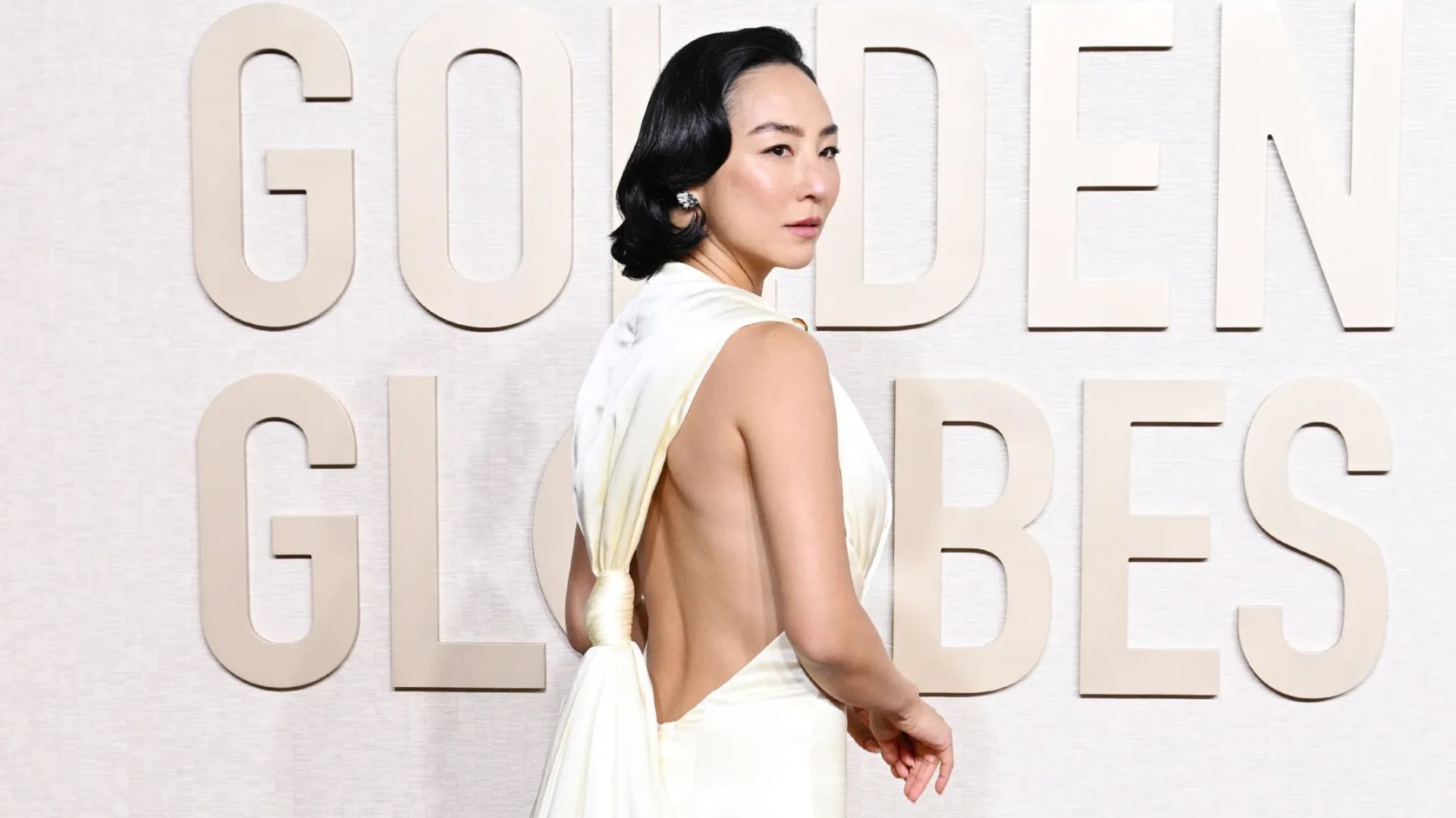 Greta Lee at the Golden Globes 2024 (Image via Golden Globes)