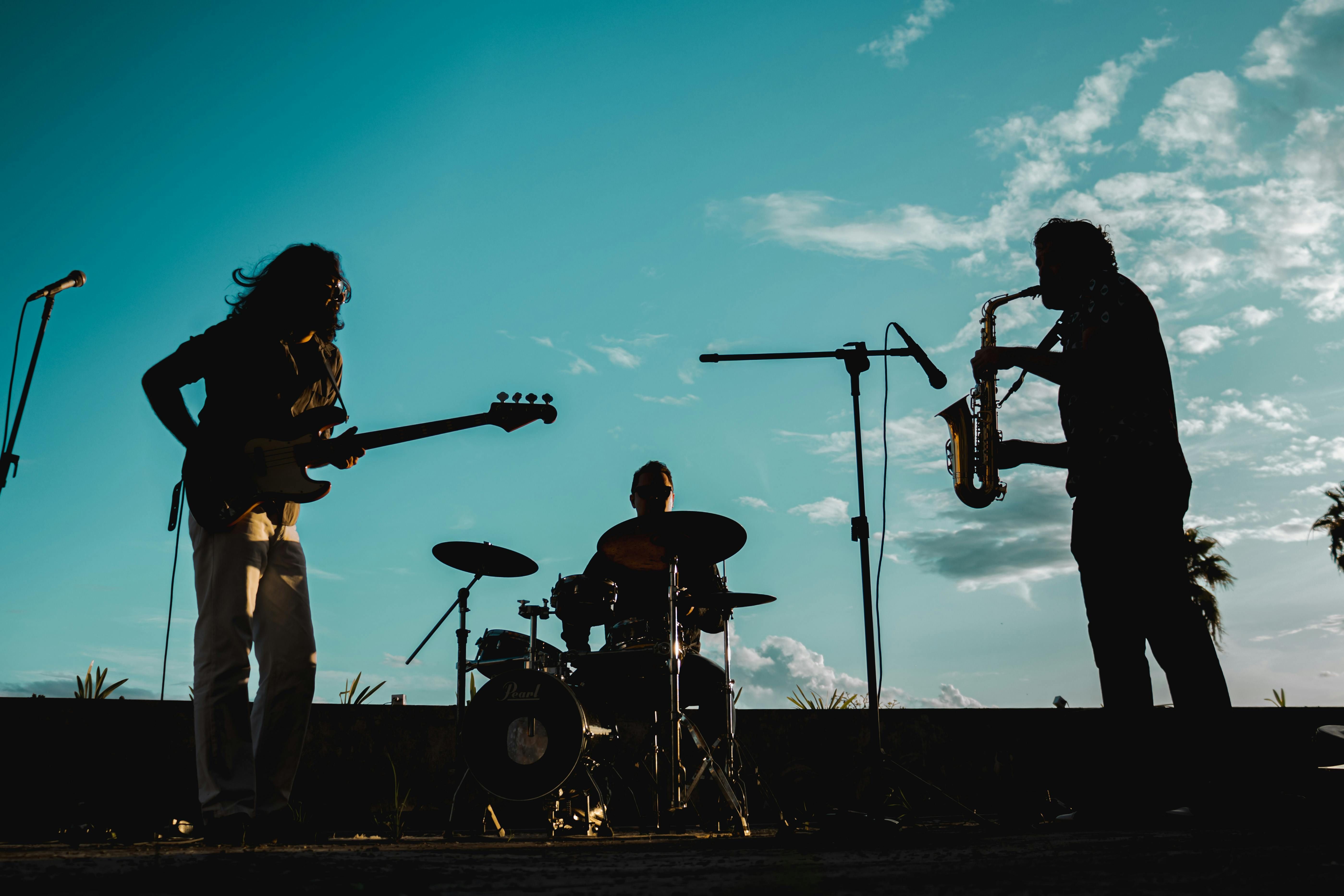 Low Angle Shot of Silhouette of a Band (Image via Pexels)