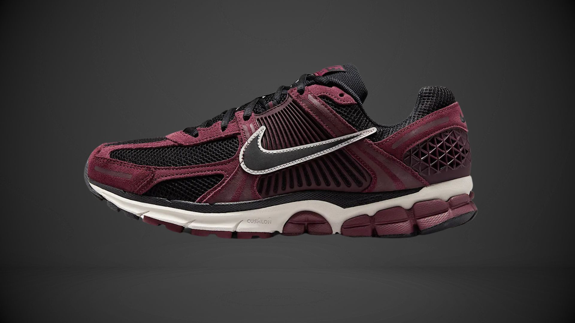 The shoe features breathable black mesh panels for airflow (Image via Nike.com)